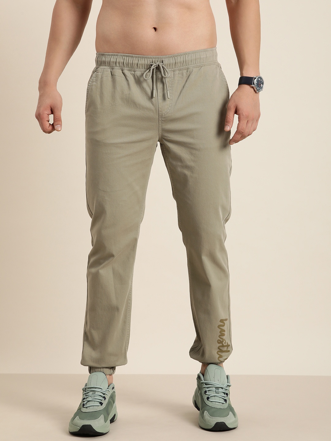 

Moda Rapido Men Pleated Solid Mid-Rise Joggers, Khaki