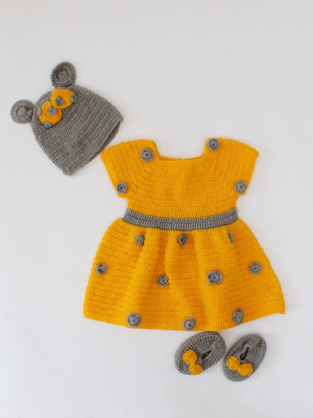 

Woonie Floral Embroidered Acrylic Dress With Cap & Booties, Mustard