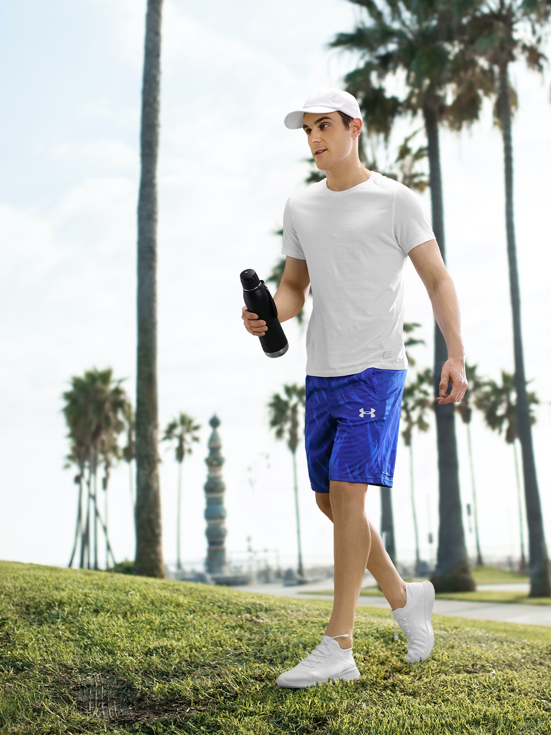 

UNDER ARMOUR Men Baseline 10'' Printed Shorts, Blue