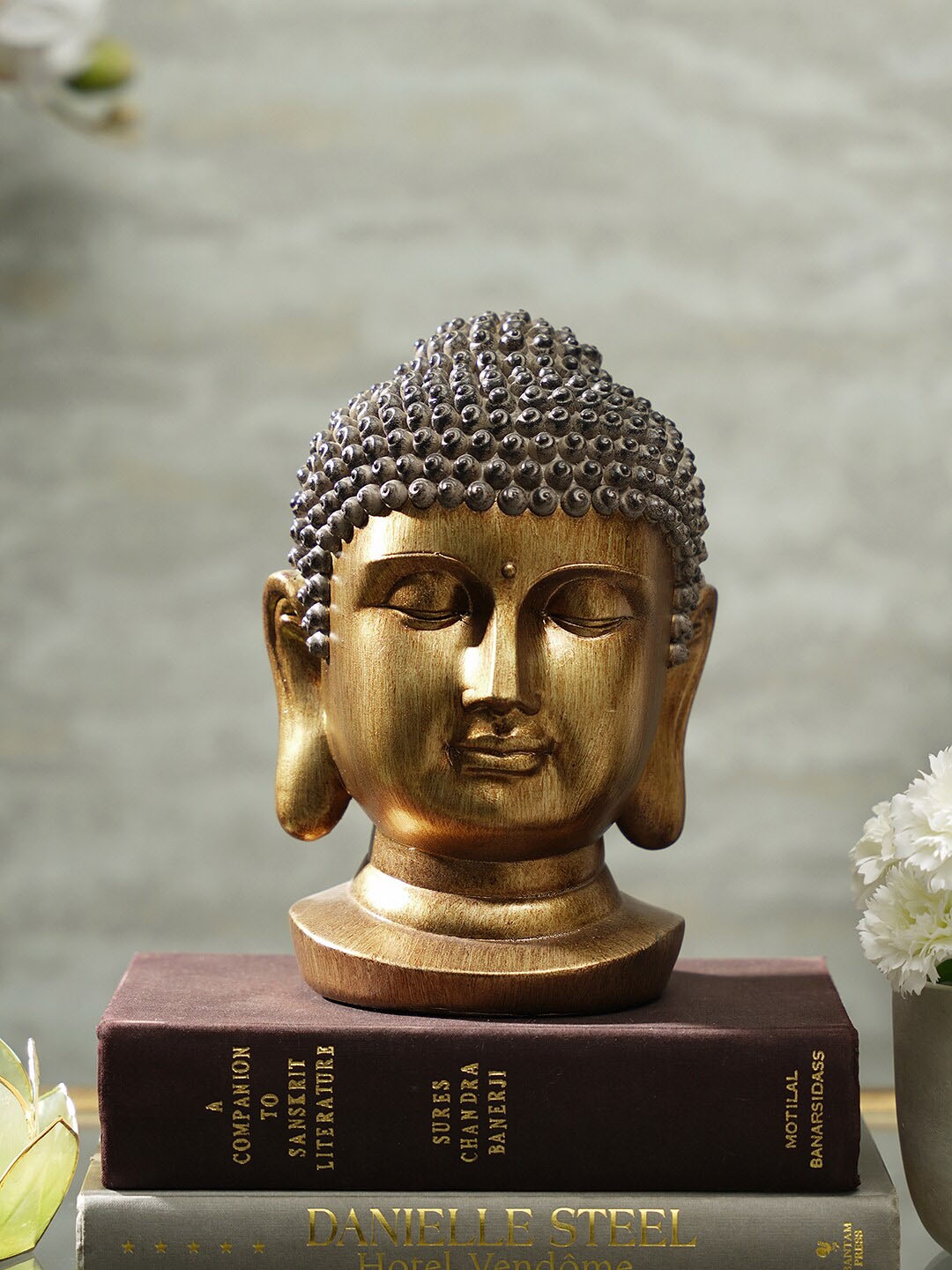 

Pure Home and Living Gold Toned Buddha Head With Round Base Showpiece