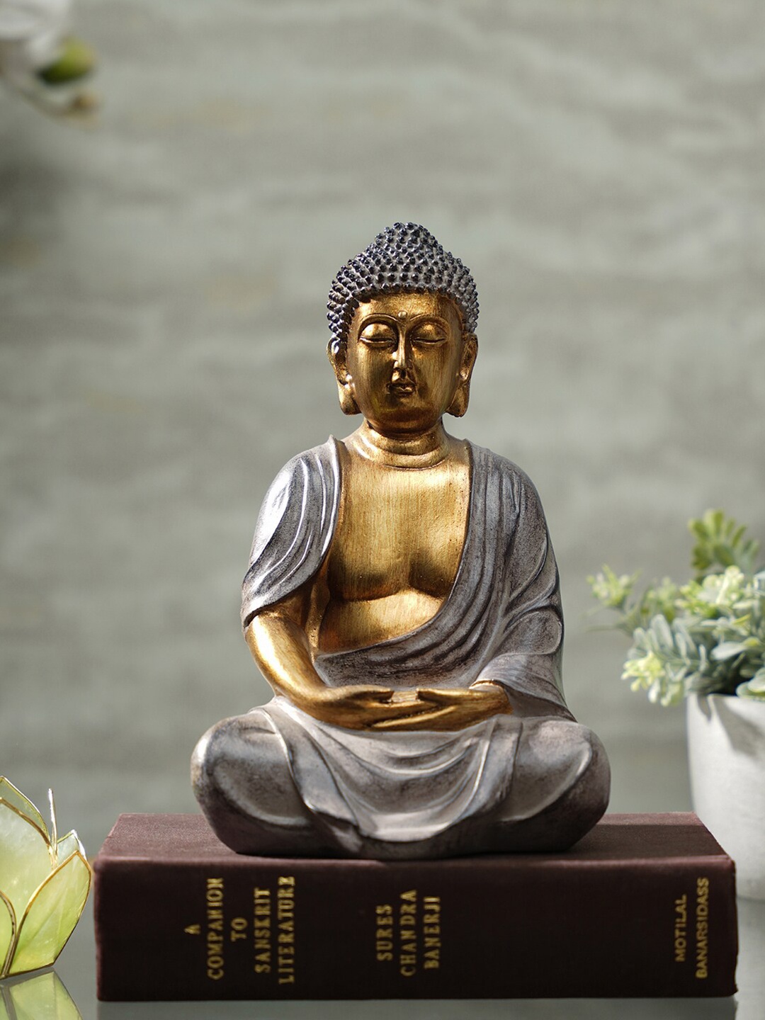 

Pure Home and Living Gold Toned Meditating Buddha Showpiece