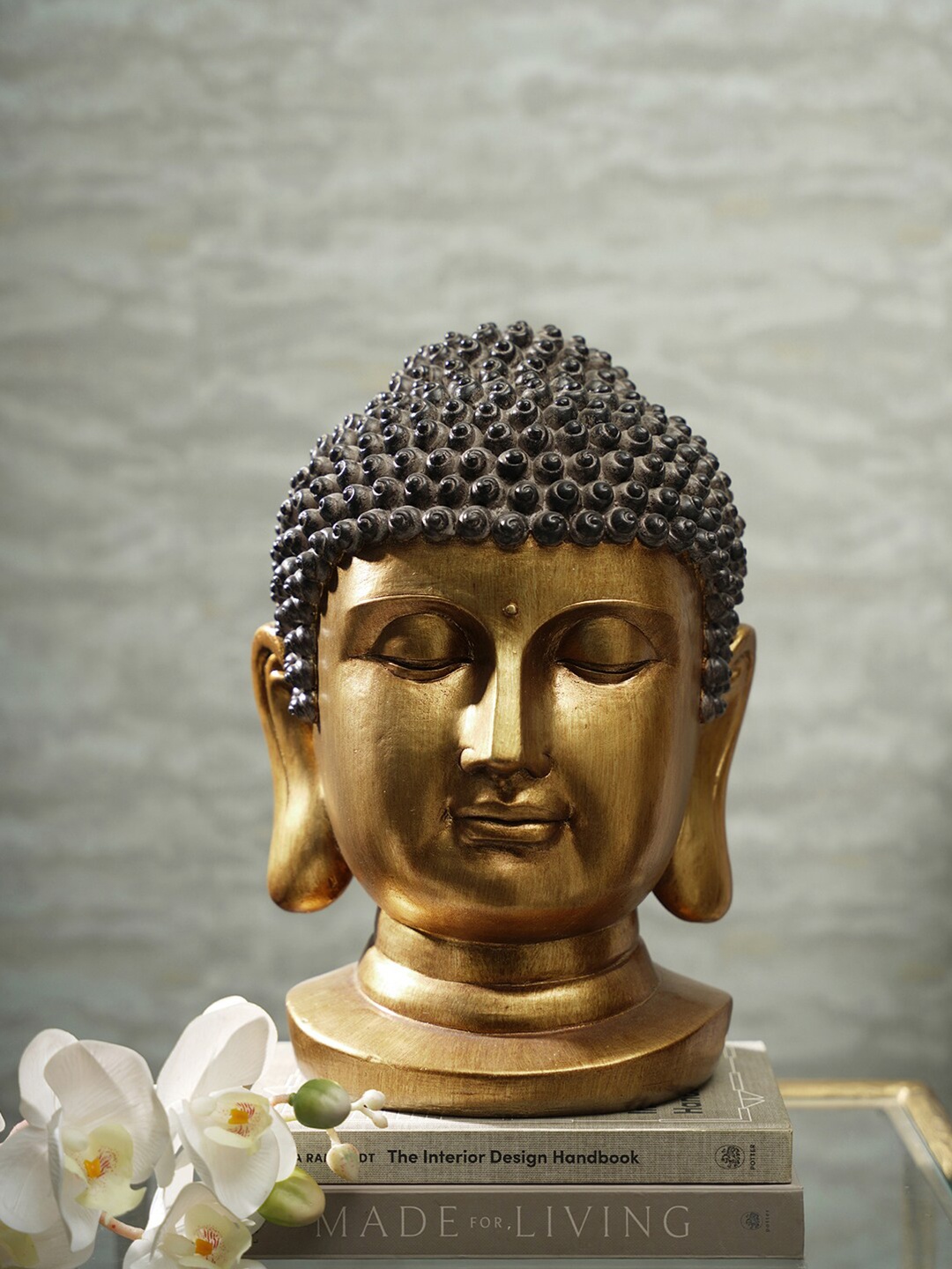 

Pure Home and Living Gold Toned Buddha Head With Round Base Showpiece