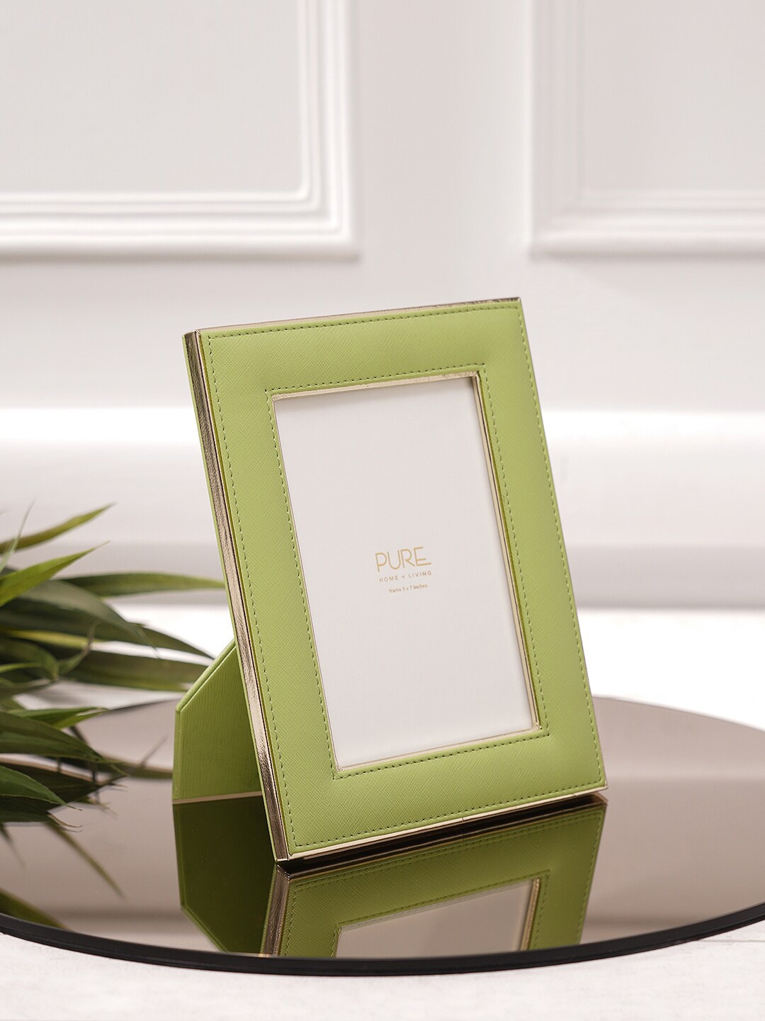 

Pure Home and Living Green & White Faux Leather Piping Details Table Photo Frame