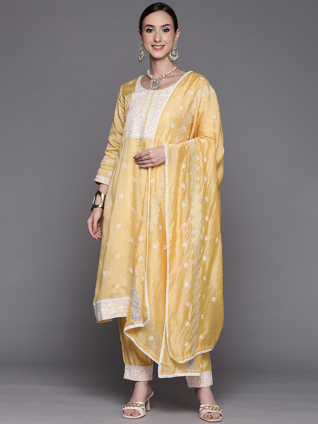

Indo Era Floral Embroidered Sequinned Chanderi Silk Kurta With Trousers & Dupatta, Yellow