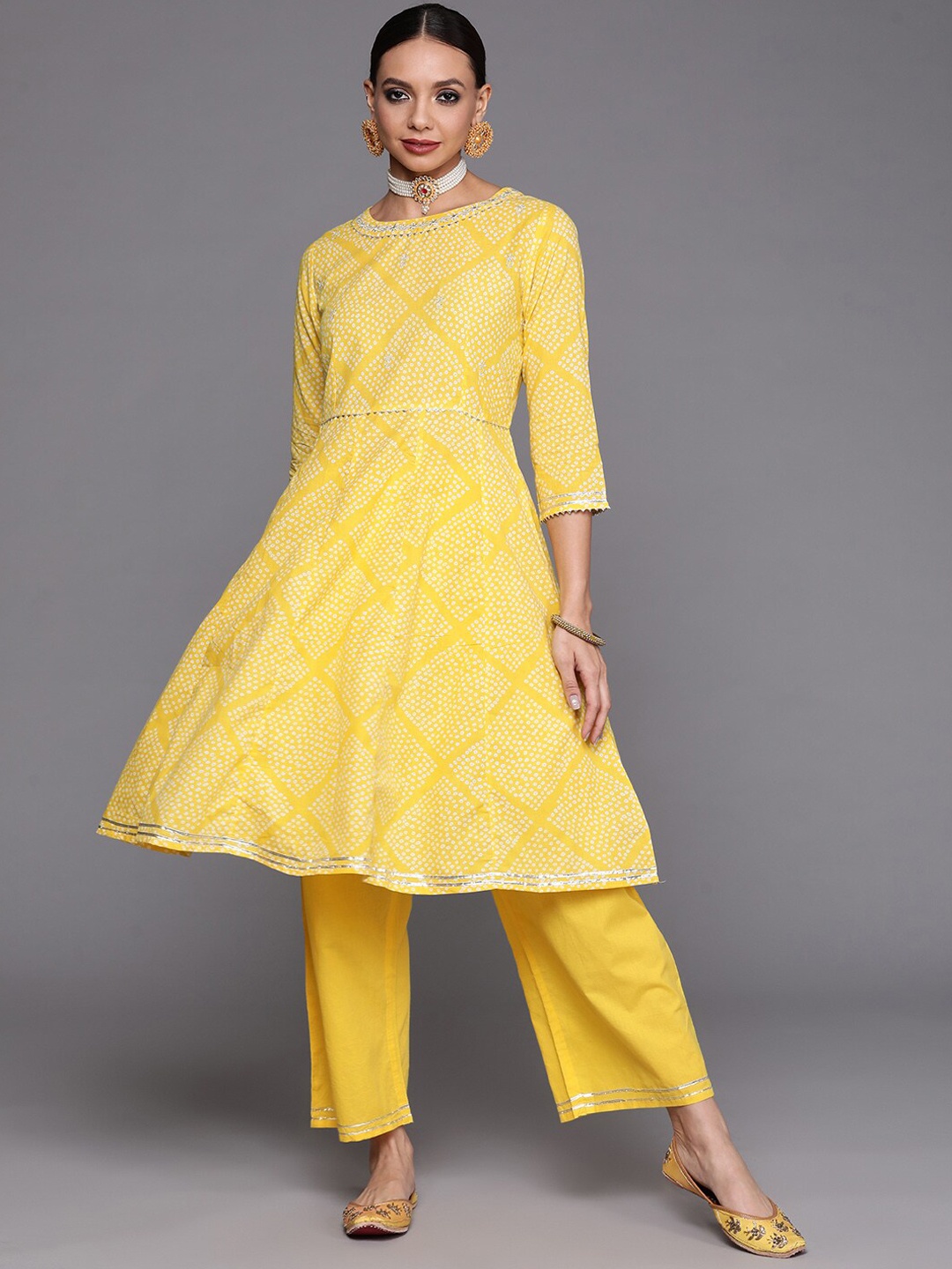 

Indo Era Bandhani Printed Gotta Patti A-line Kurta with Palazzo Set, Yellow