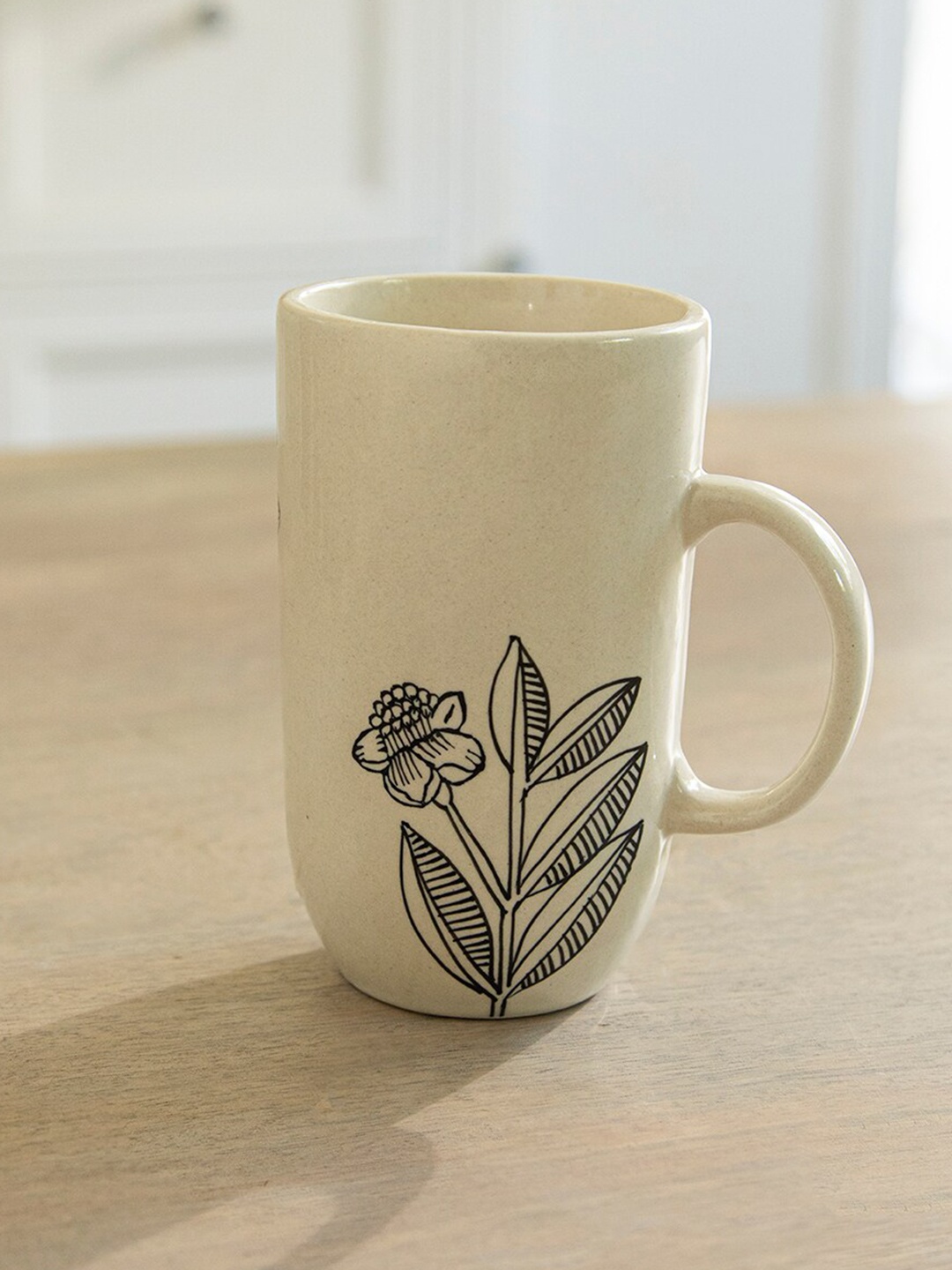 

ellementry Livada Off White & Black Printed Ceramic Matte Tall Mug 500 ml