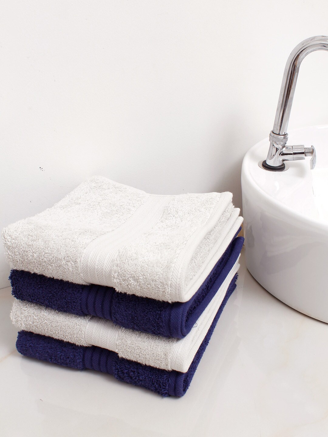 

AVI Living Off White & Blue 4 Pcs Striped 650 GSM Pure Cotton Highly Absorbent Hand Towels