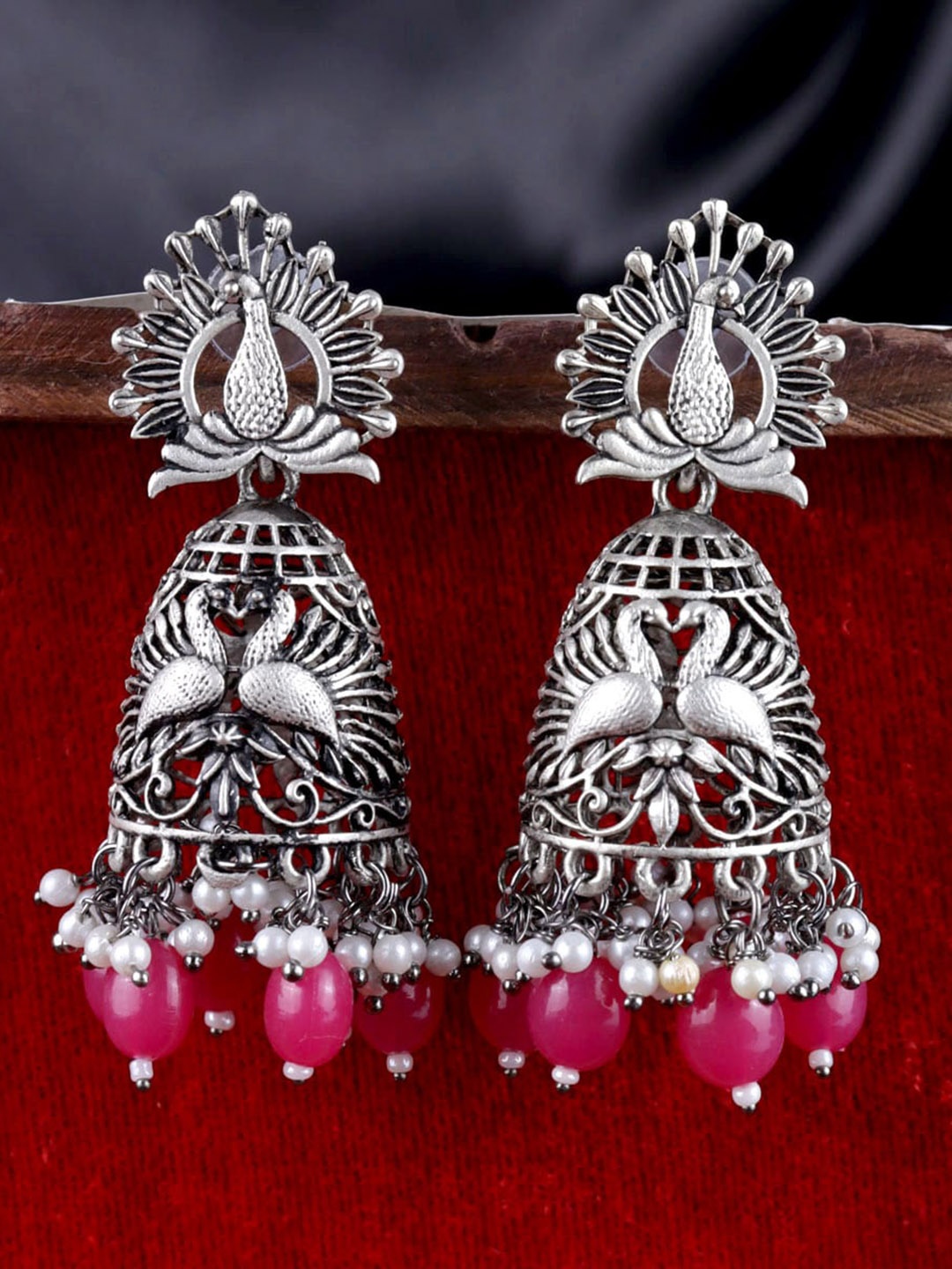 

VAGHBHATT Silver-Plated Peacock Shaped Jhumkas Earrings, Pink