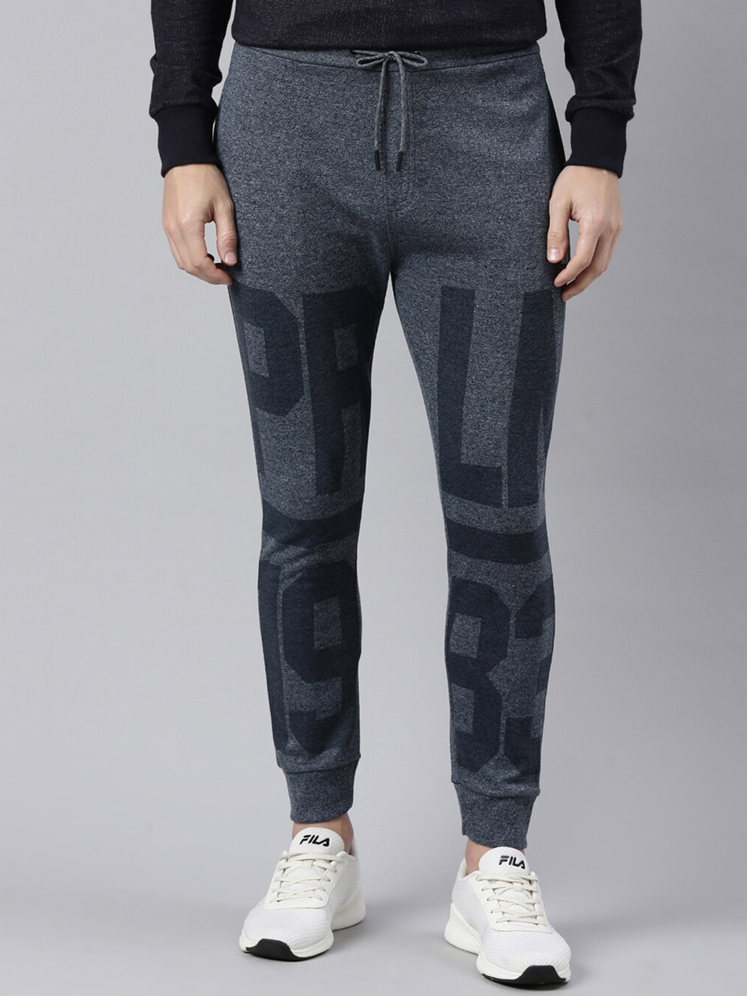 

Proline Men Printed Mid Rise Cotton Joggers, Blue