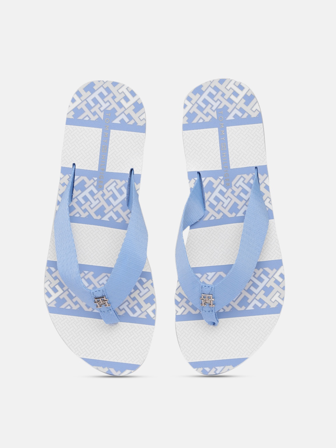 

Tommy Hilfiger Women Solid Thong Flip Flops With Brand Logo Print Footbed, Blue