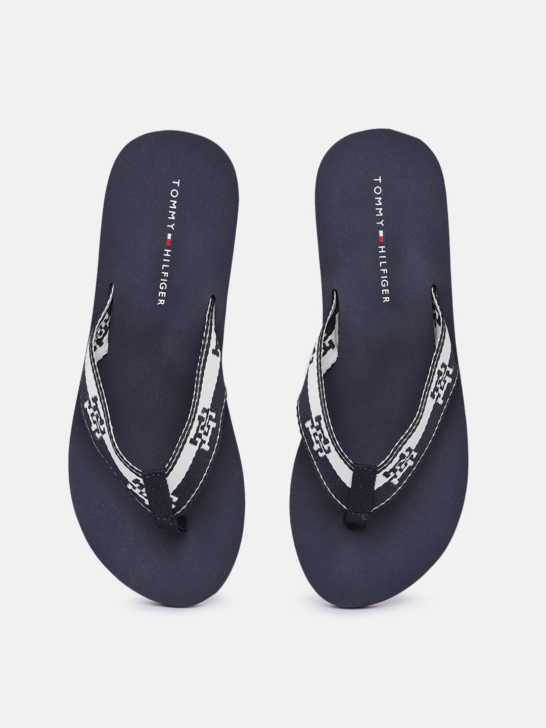 

Tommy Hilfiger Women Brand Logo Embroidered Thong Flip Flops, Navy blue