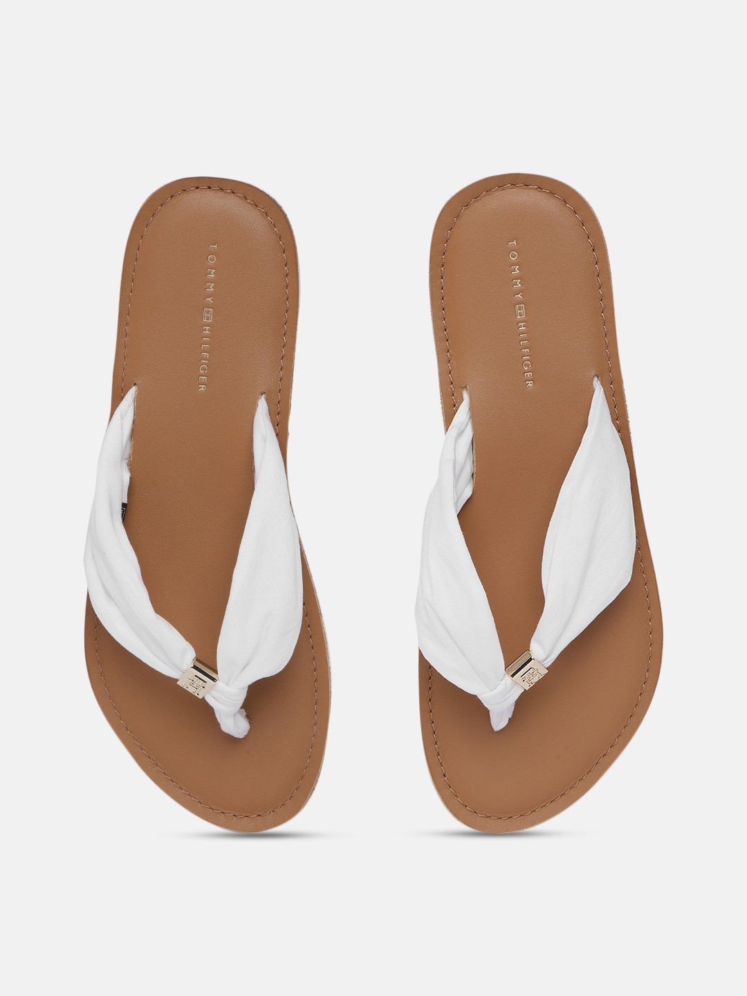 

Tommy Hilfiger Women Solid Thong Flip Flops, White