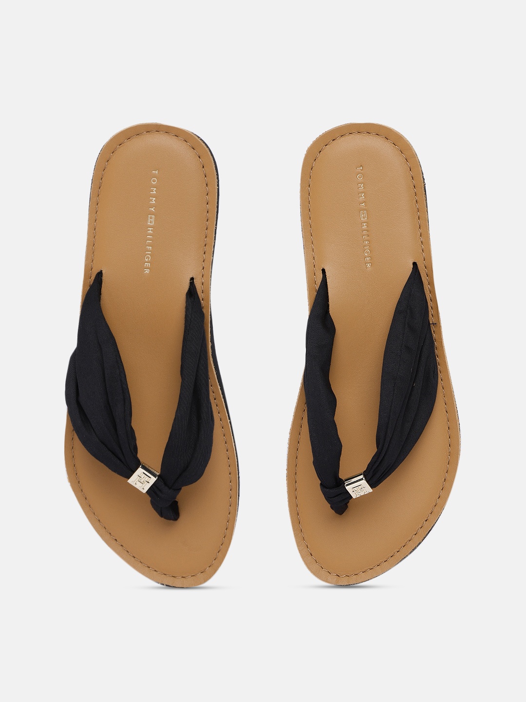 

Tommy Hilfiger Women Solid Thong Flip Flops, Black