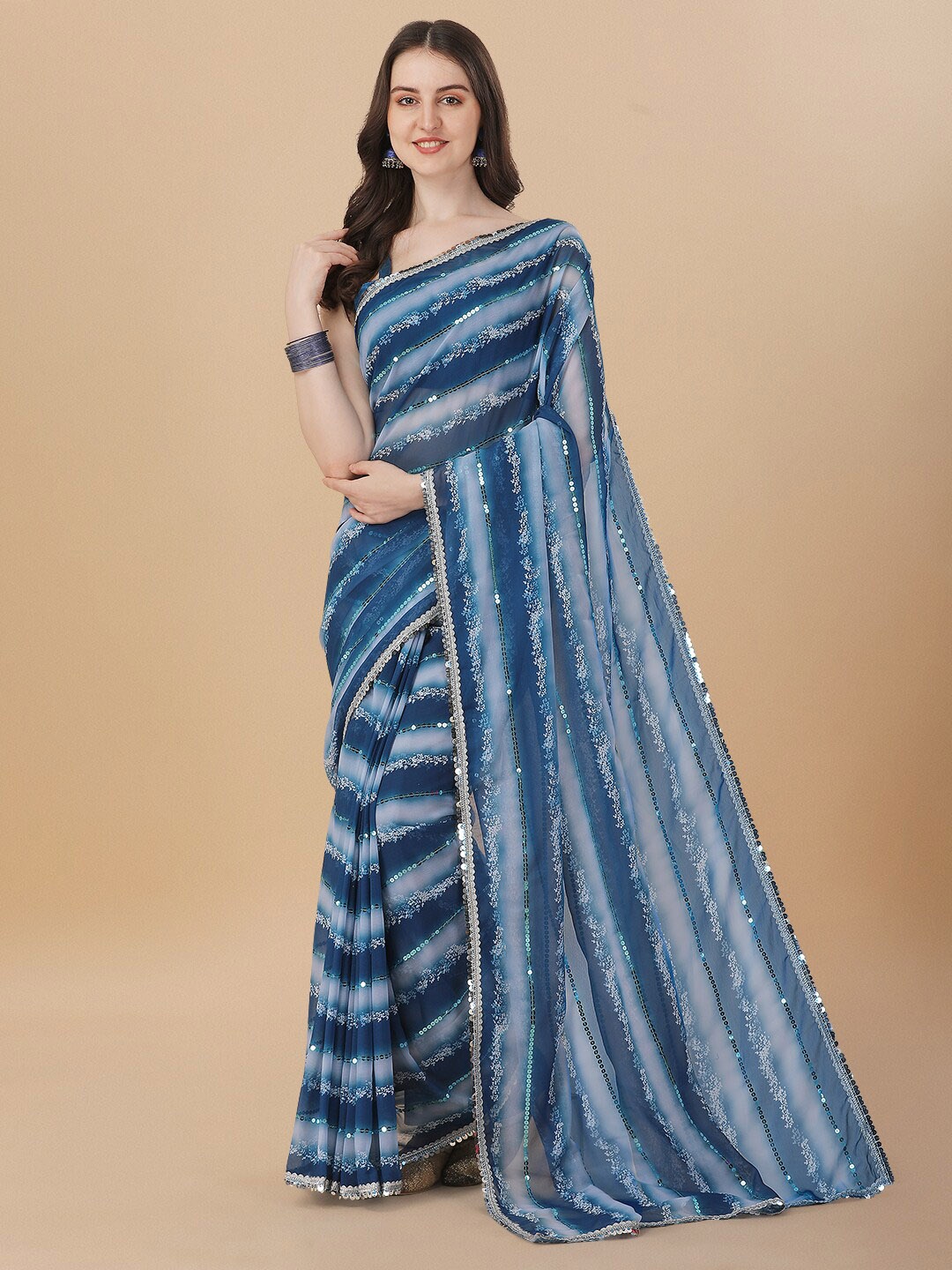 

Fab Viva Abstract Printed Sequinned Pure Georgette Saree, Teal