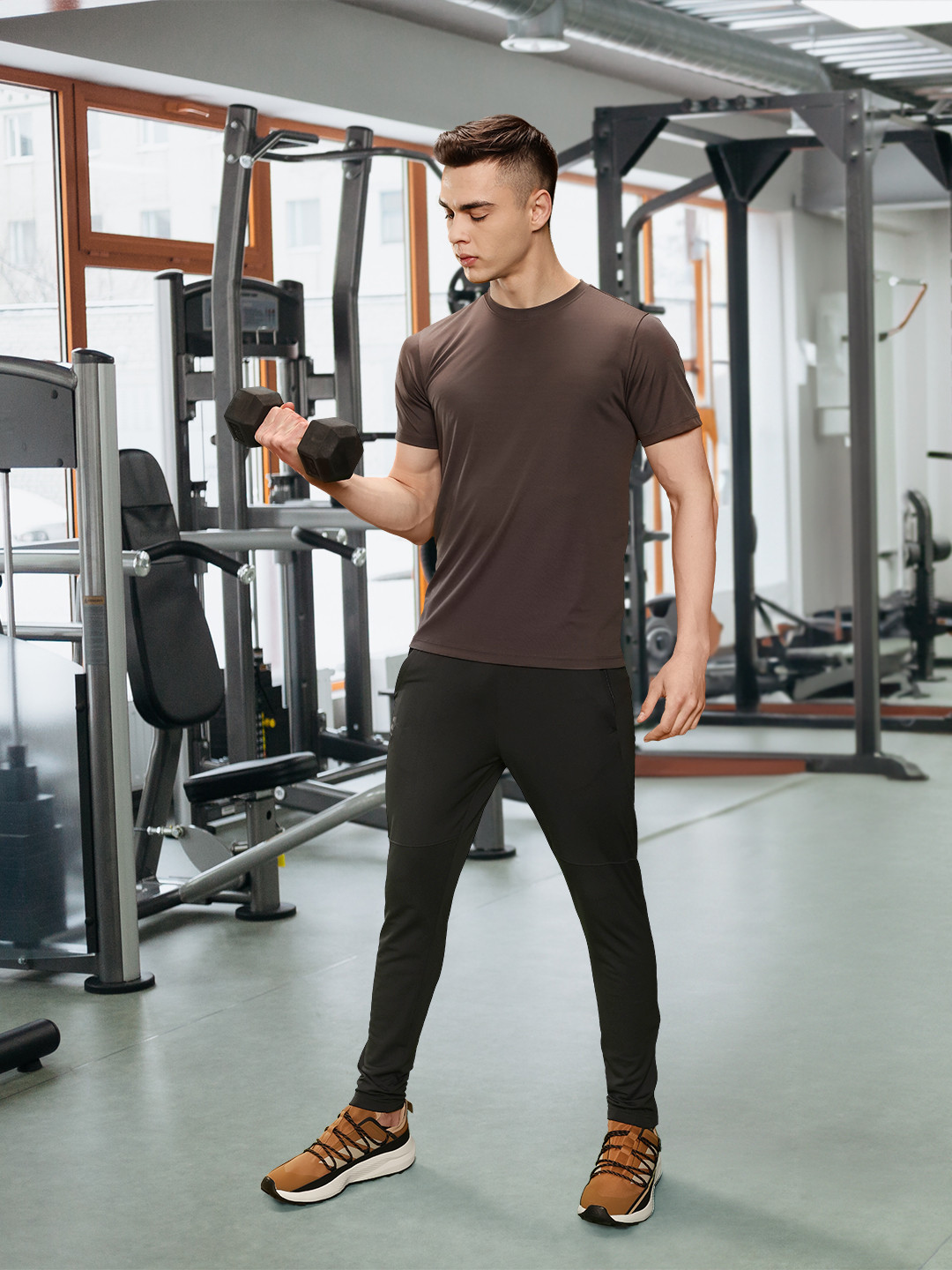 

UNDER ARMOUR Men Solid Mid-Rise Regular Fit Sports Track Pants, Black