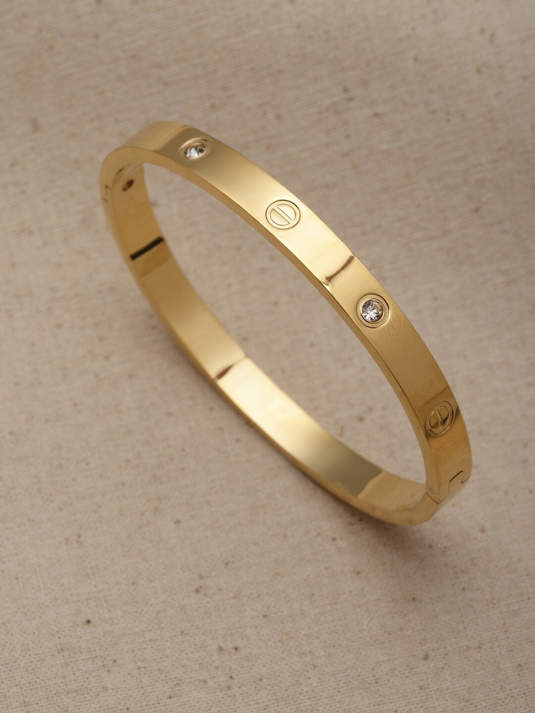 

VOGUE PANASH Women Gold-Toned & White Handcrafted Gold-Plated Kada Bracelet