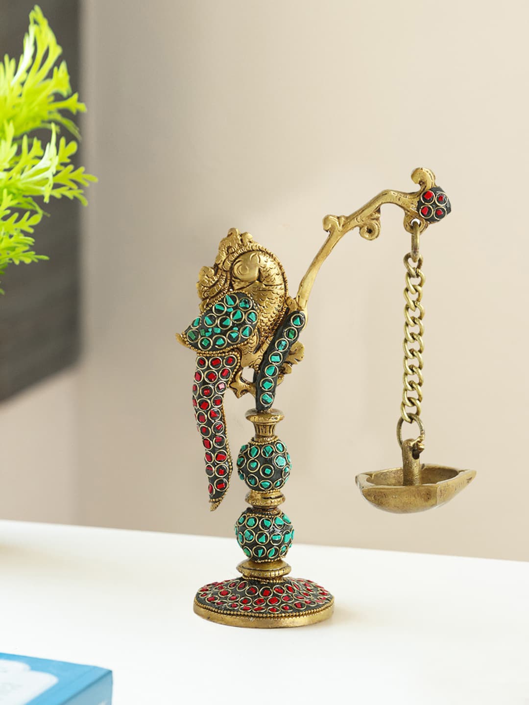 

ExclusiveLane Gold-Toned & Green Parrot design Brass Hanging Diya With 5 Wicks