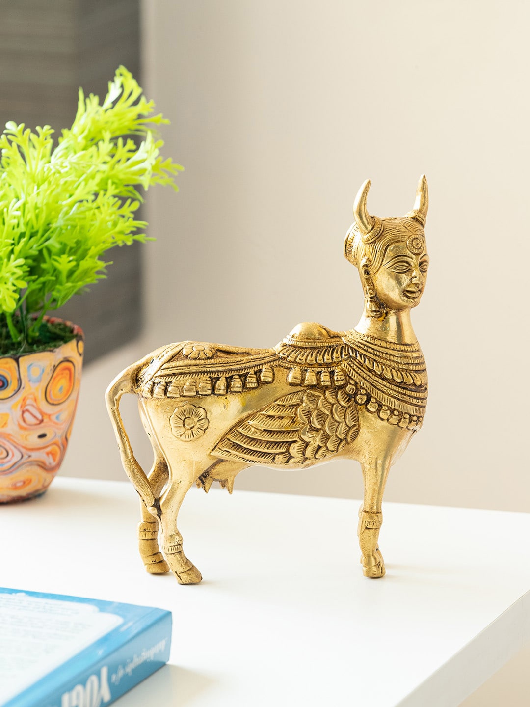 

ExclusiveLane Gold-Toned Kamdhenu Cow Brass Showpiece Idol