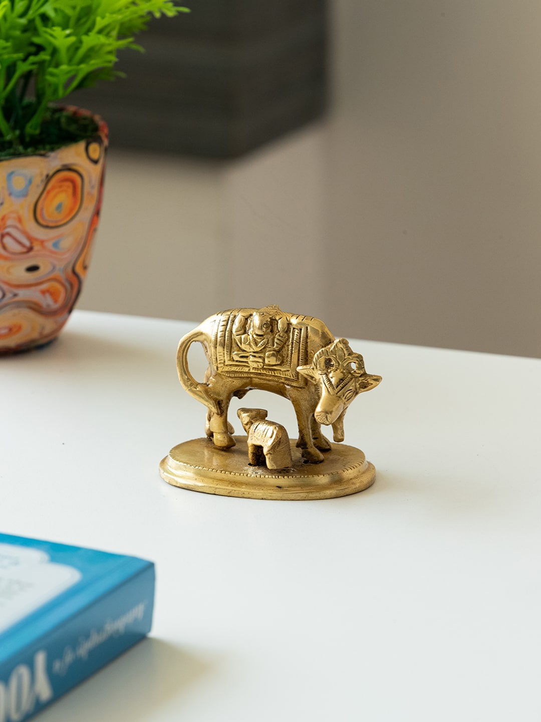 

ExclusiveLane Gold-Toned Kamdhenu Cow With Calf Brass Showpiece