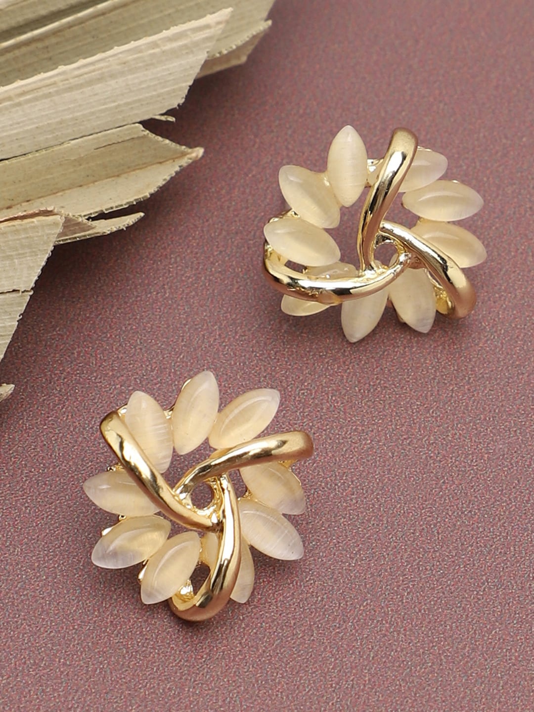 

SOHI Gold Plated Floral Shaped Stone Studded Studs Earrings, White