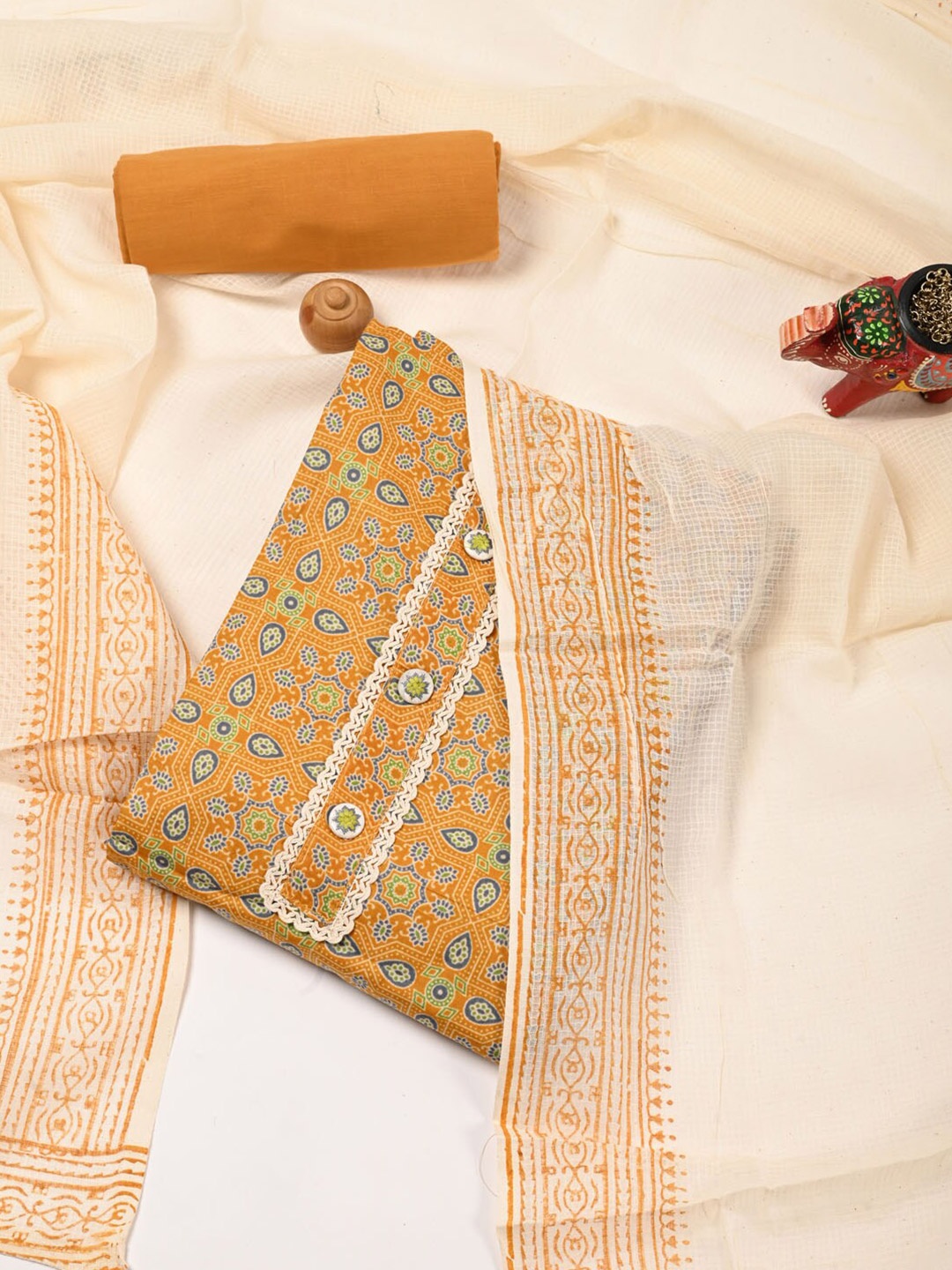 

Meena Bazaar Printed Pure Silk Unstitched Dress Material, Mustard