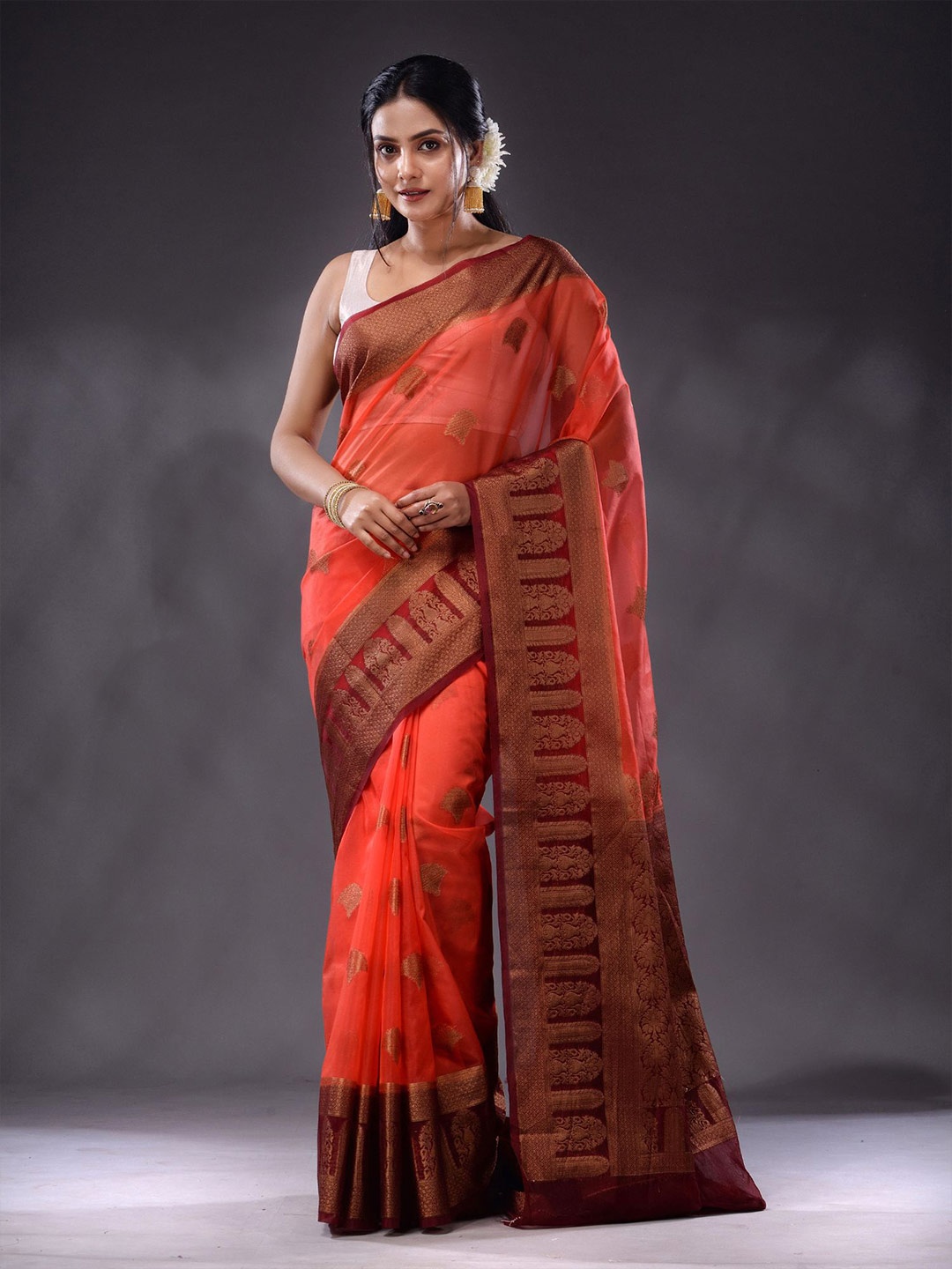 

Charukriti Ethnic Motifs Woven Design Zari Organza Saree, Orange