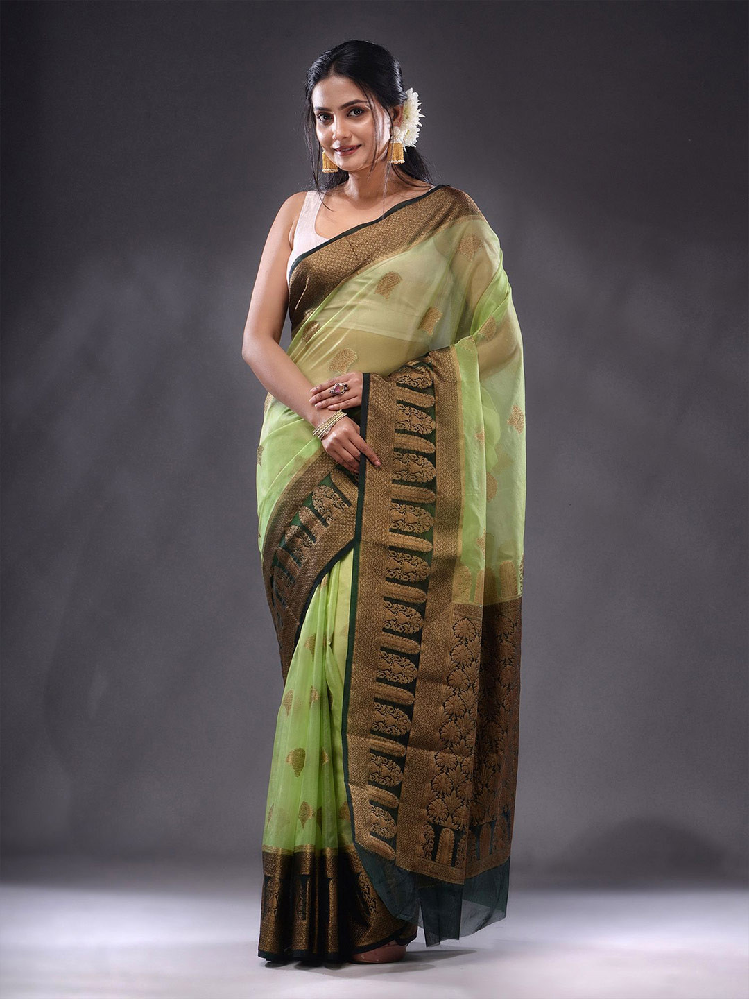 

Charukriti Ethnic Motif Woven Design Zari Organza Saree, Lime green