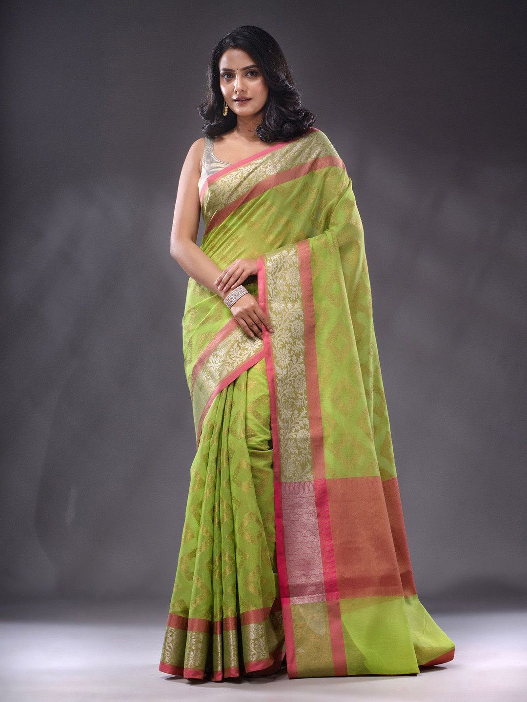 

Charukriti Geometric Woven Design Zari Saree, Green