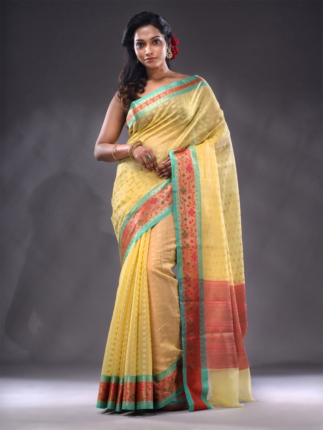 

Charukriti Ethnic Motifs Woven Design Zari Kota Saree, Yellow