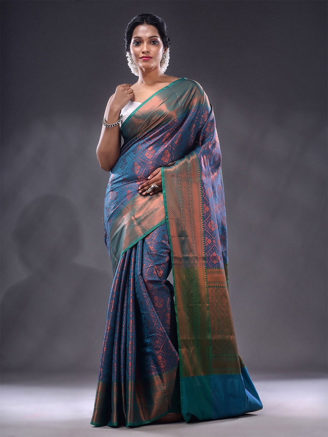 

Charukriti Floral Motifs Woven Design Zari Saree, Blue