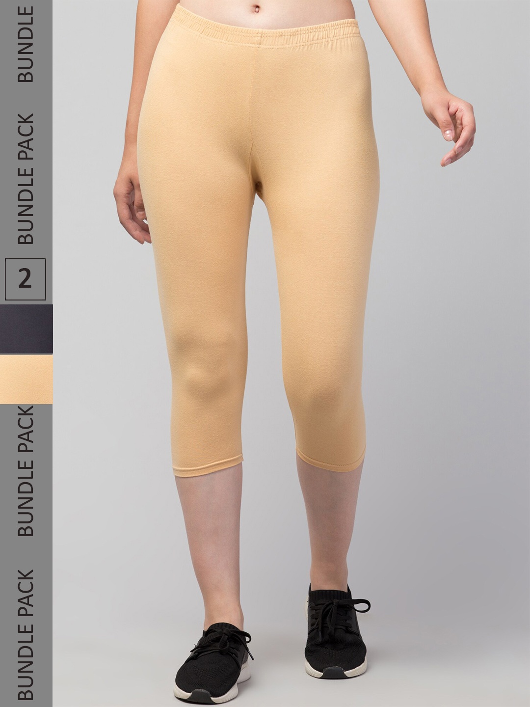 

Apraa & Parma Women Beige & Grey Skinny Fit Capris