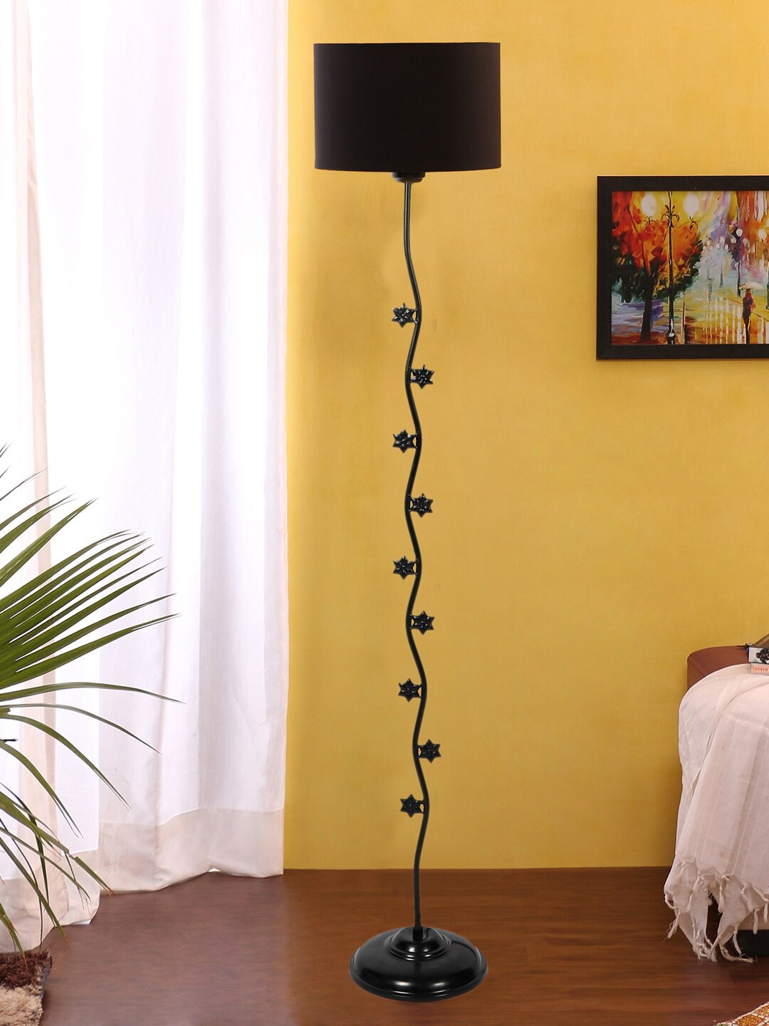 

Devansh Black Textured Star Floor Lamp With Cotton Drum Shade