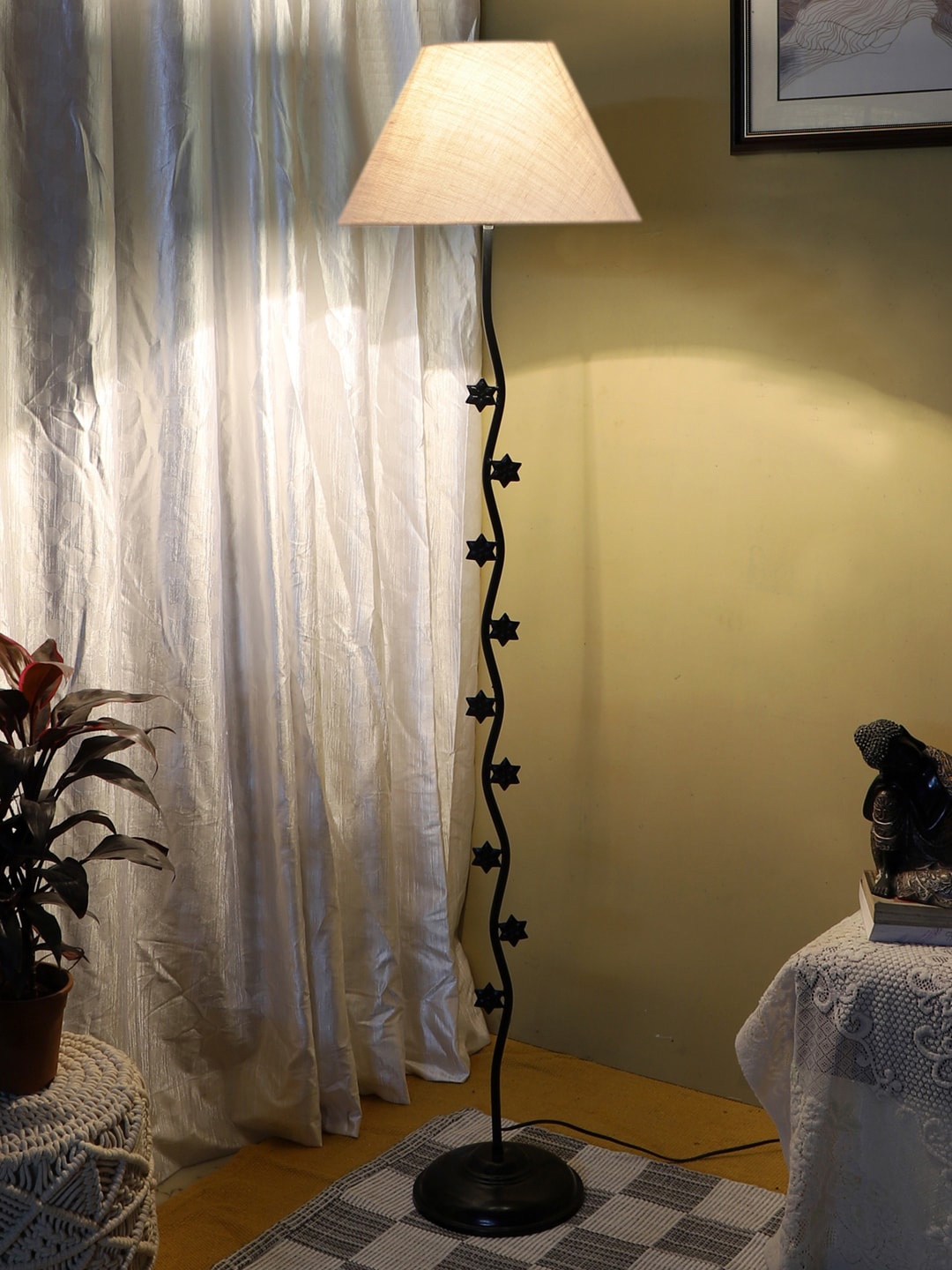 

Devansh White & Black Textured Star Floor Lamp With Jute Conical shade