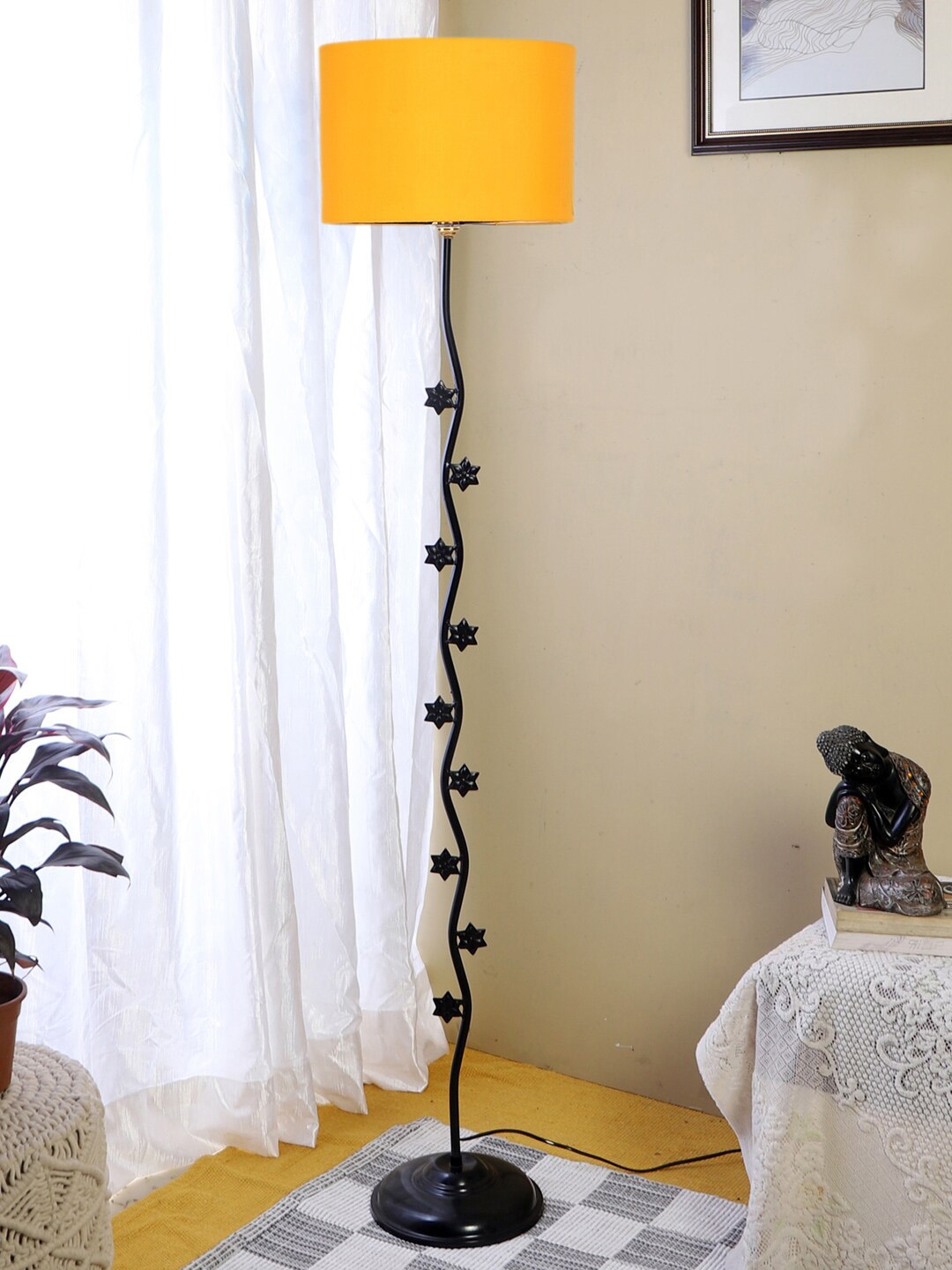 

Devansh Yellow & Black Textured Star Floor Lamp with Cotton Drum Shade