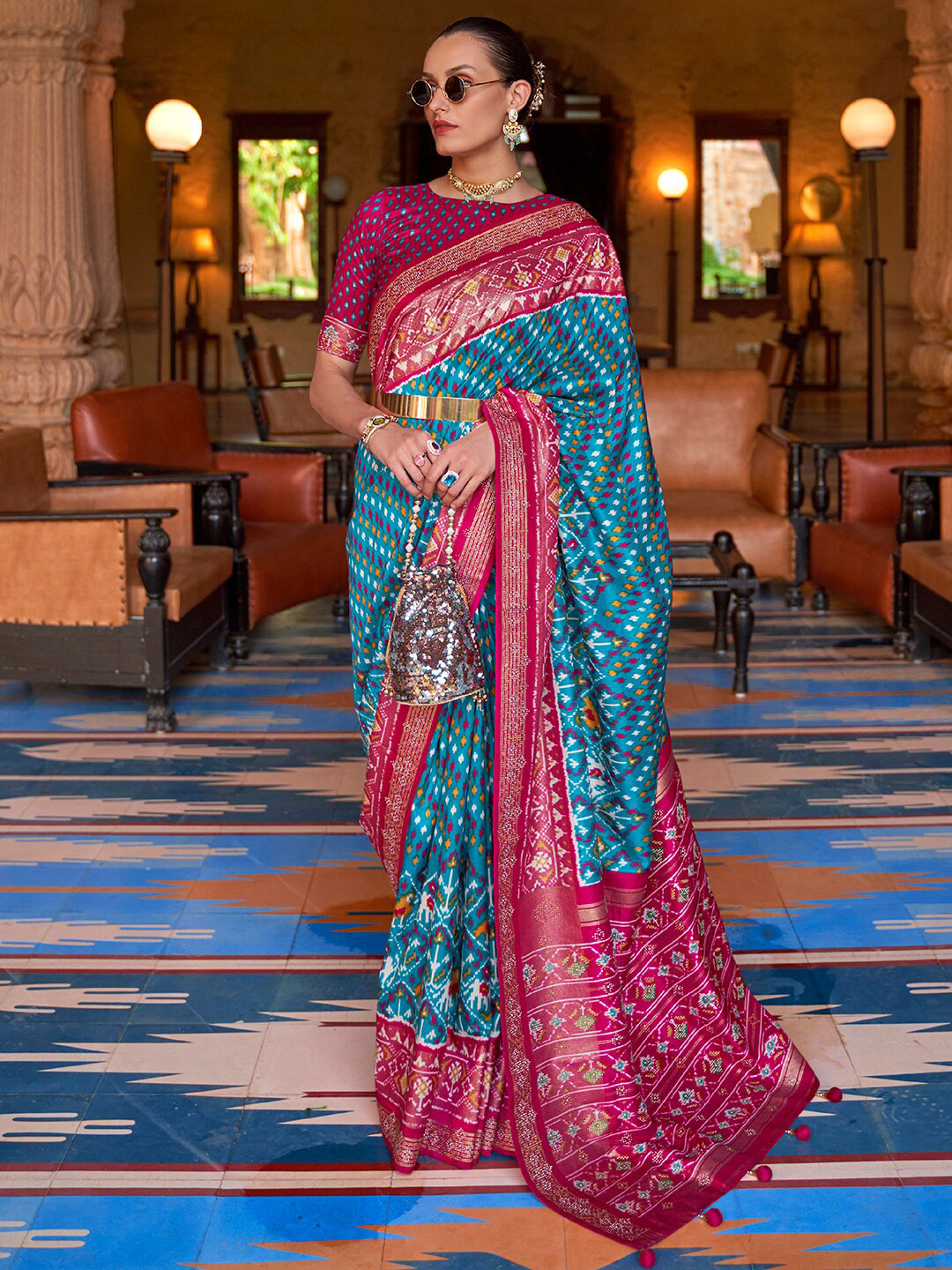

Anouk Ethnic Motifs Printed Embellished Patola Saree, Blue