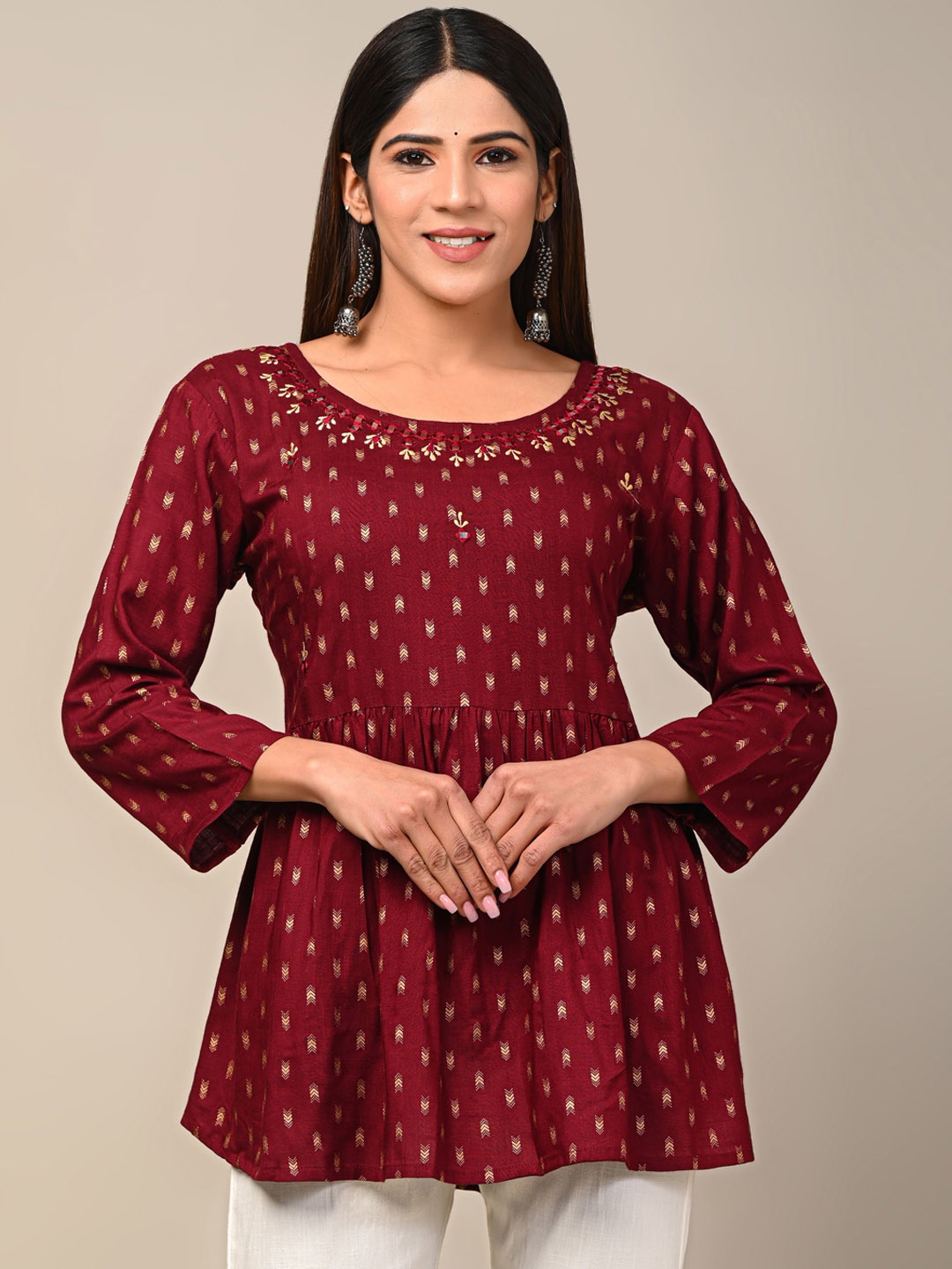 

DHRTI Ethnic Motifs Printed Thread Work Cotton A-Line Kurti, Maroon