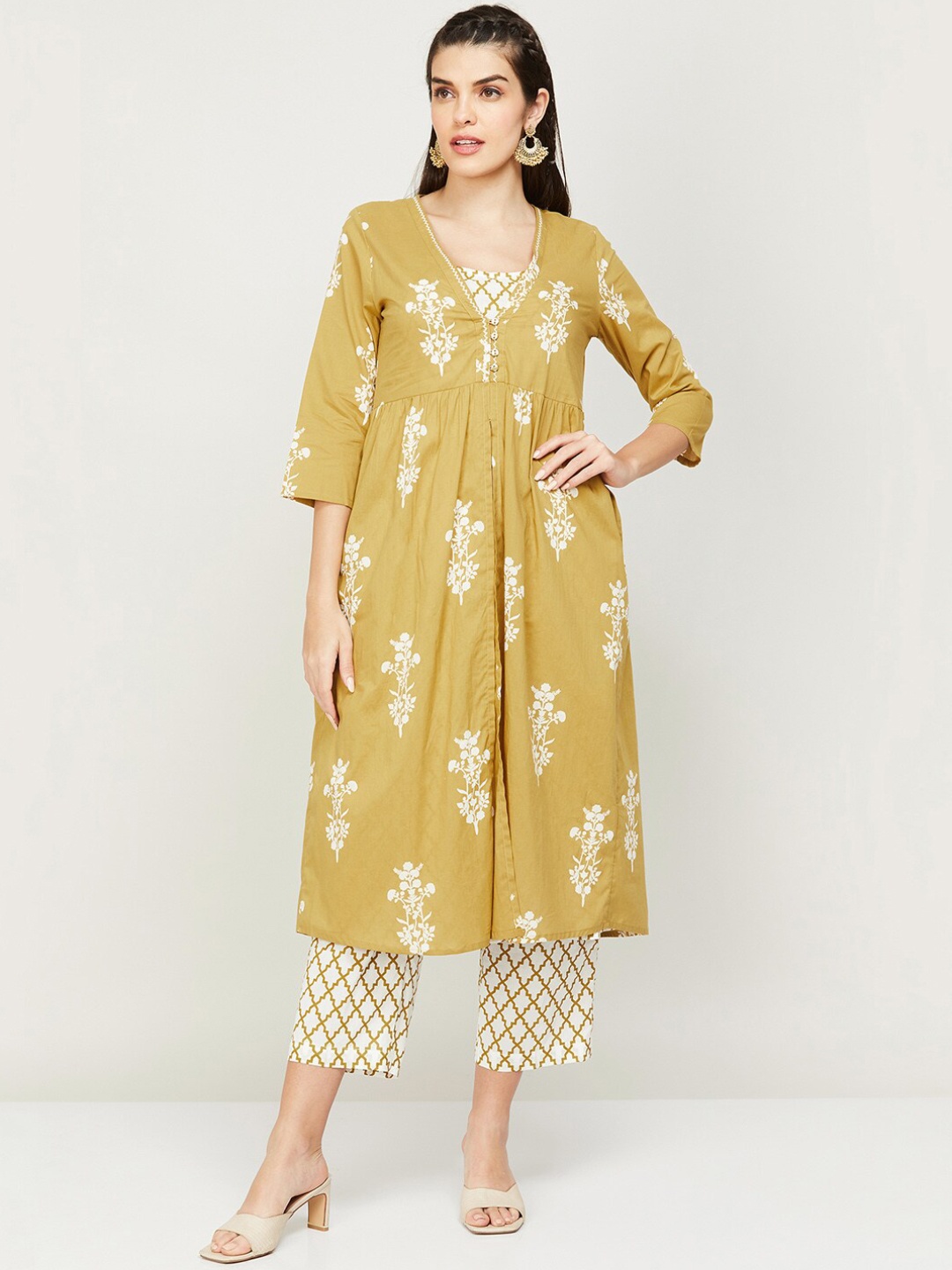 

Melange by Lifestyle Women Yellow Floral Printed Pure Cotton Kurta with Trousers