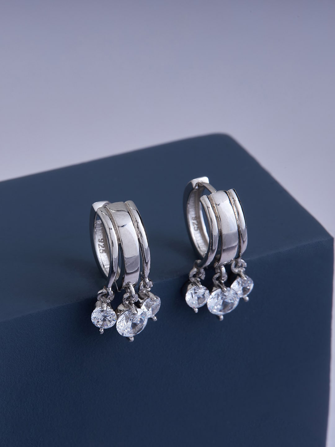 

Kushal's Fashion Jewellery White Contemporary Hoop Earrings