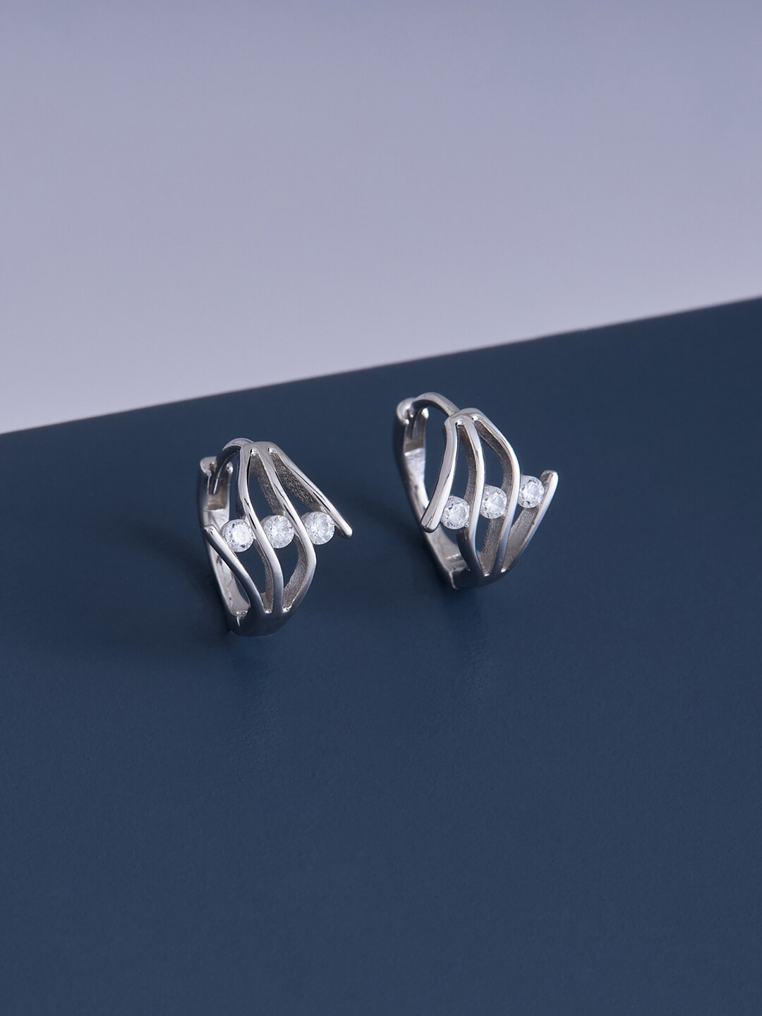 

Kushal's Fashion Jewellery White Contemporary Studs Earrings