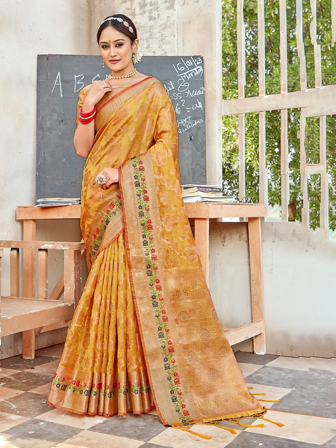 

SANGAM PRINTS Ethnic Motifs Woven Design Zari Organza Saree, Mustard