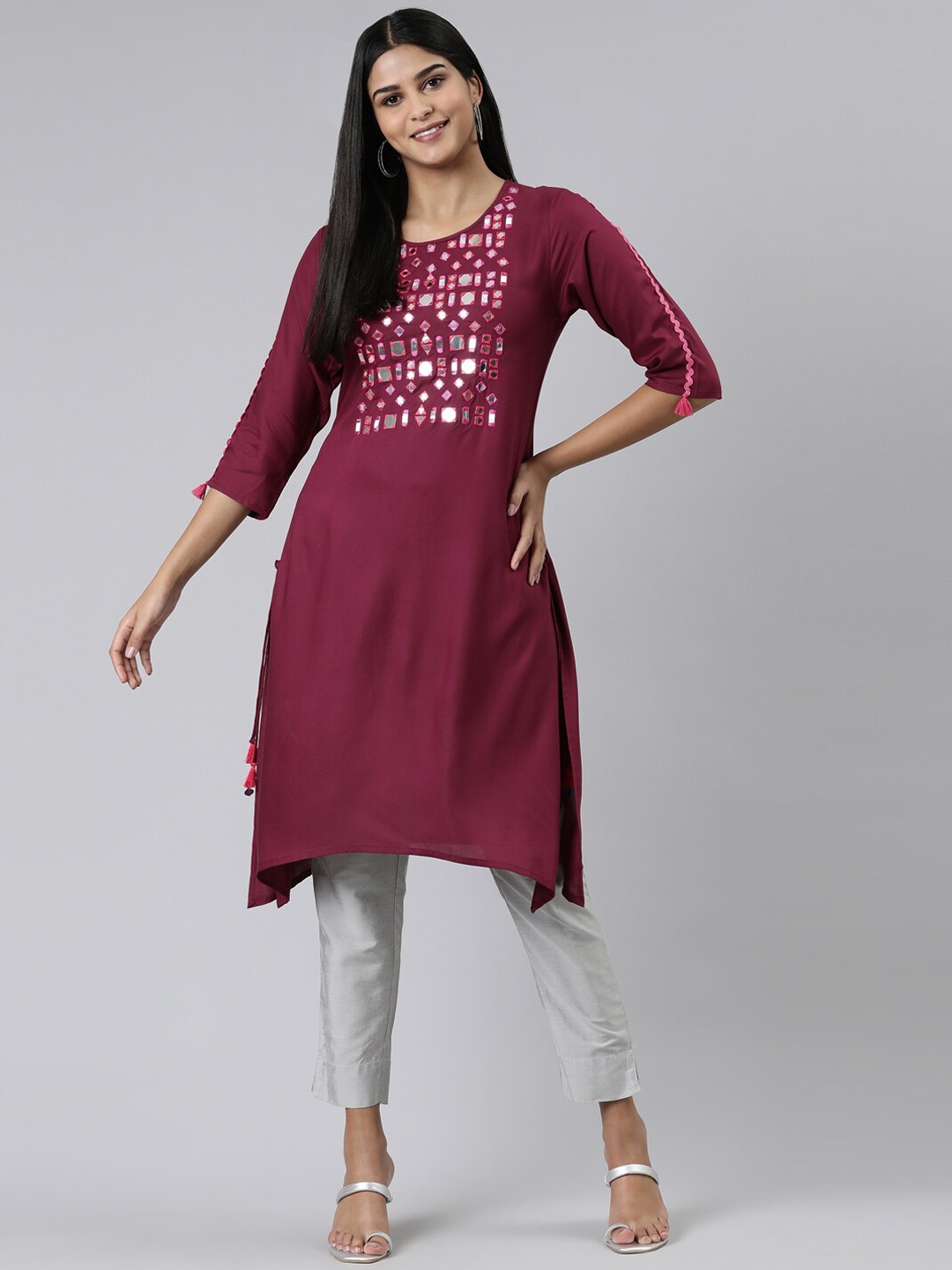 

Neerus Asymmetric Embellished Mirror Work A-Line Kurta, Magenta
