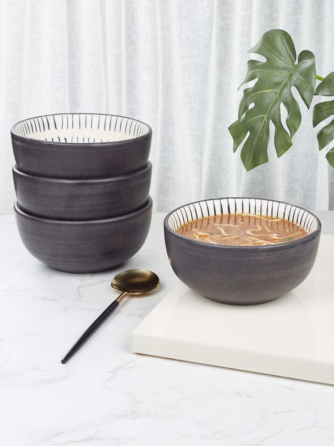 

HomeTown Artisanal Studio Black & Off White 4 Pieces Printed Stoneware Matte Bowls