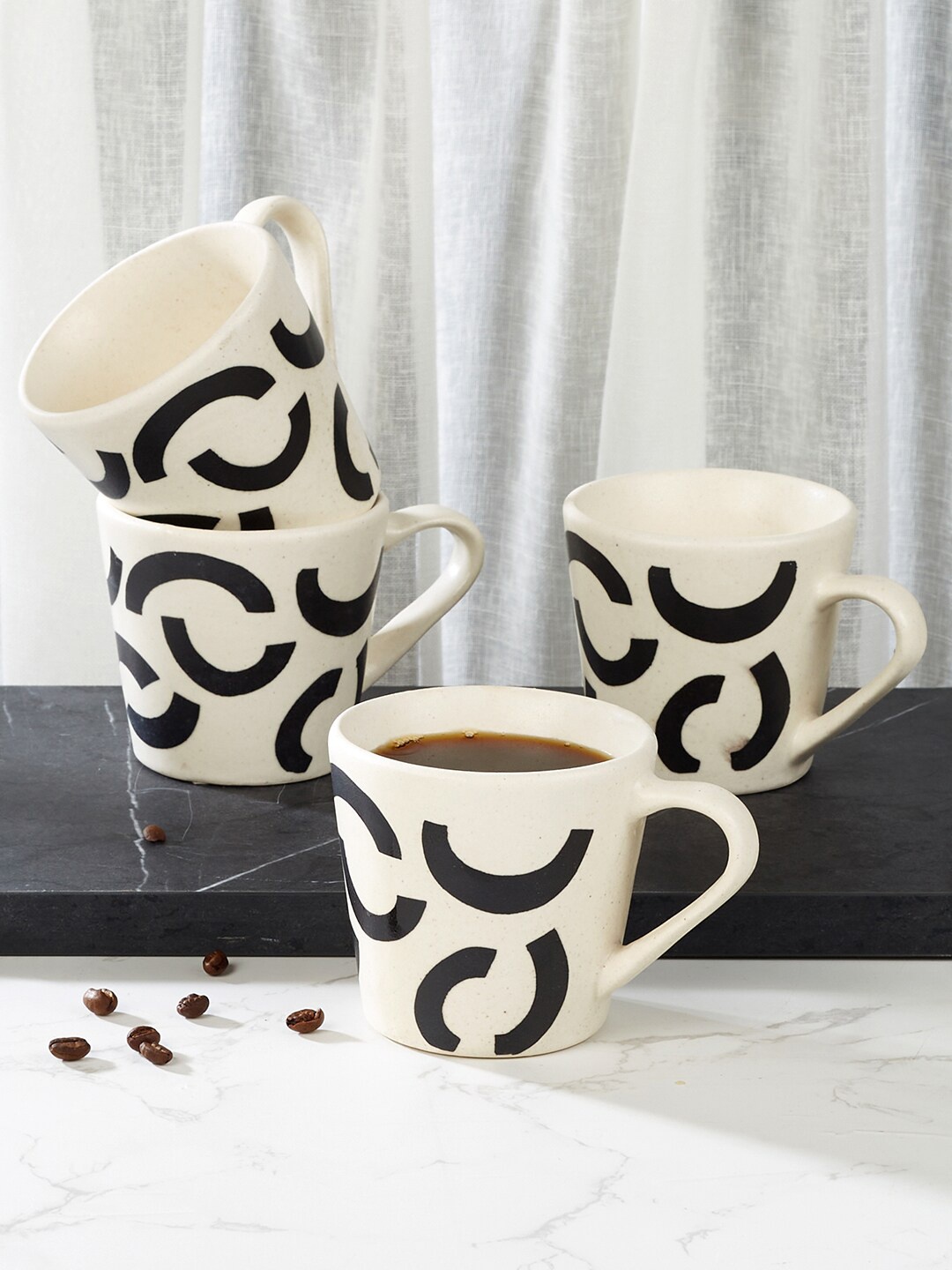 

HomeTown Artisanal Studio Off White & Black 4 Pieces Geometric Stoneware Mugs 220 ml Each