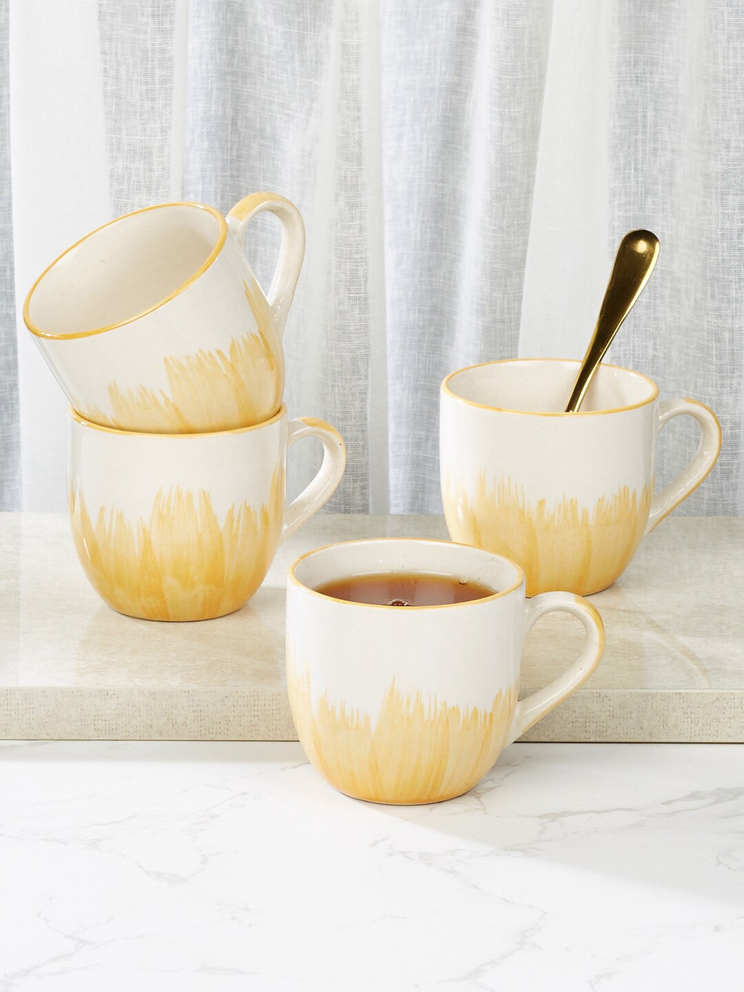 

HomeTown Ophilia Studio Off White & Yellow 2 Pieces Printed Stoneware Mugs 180 ml Each