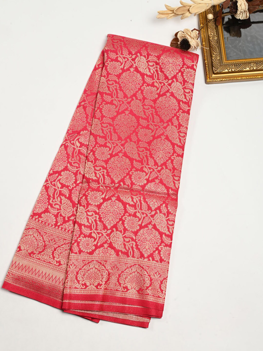 

Meena Bazaar Pink & Gold-Toned Woven Design Zari Art Silk Saree