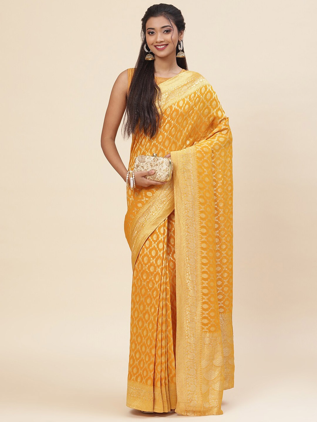 

Meena Bazaar Mustard & Gold-Toned Woven Design Zari Pure Georgette Saree