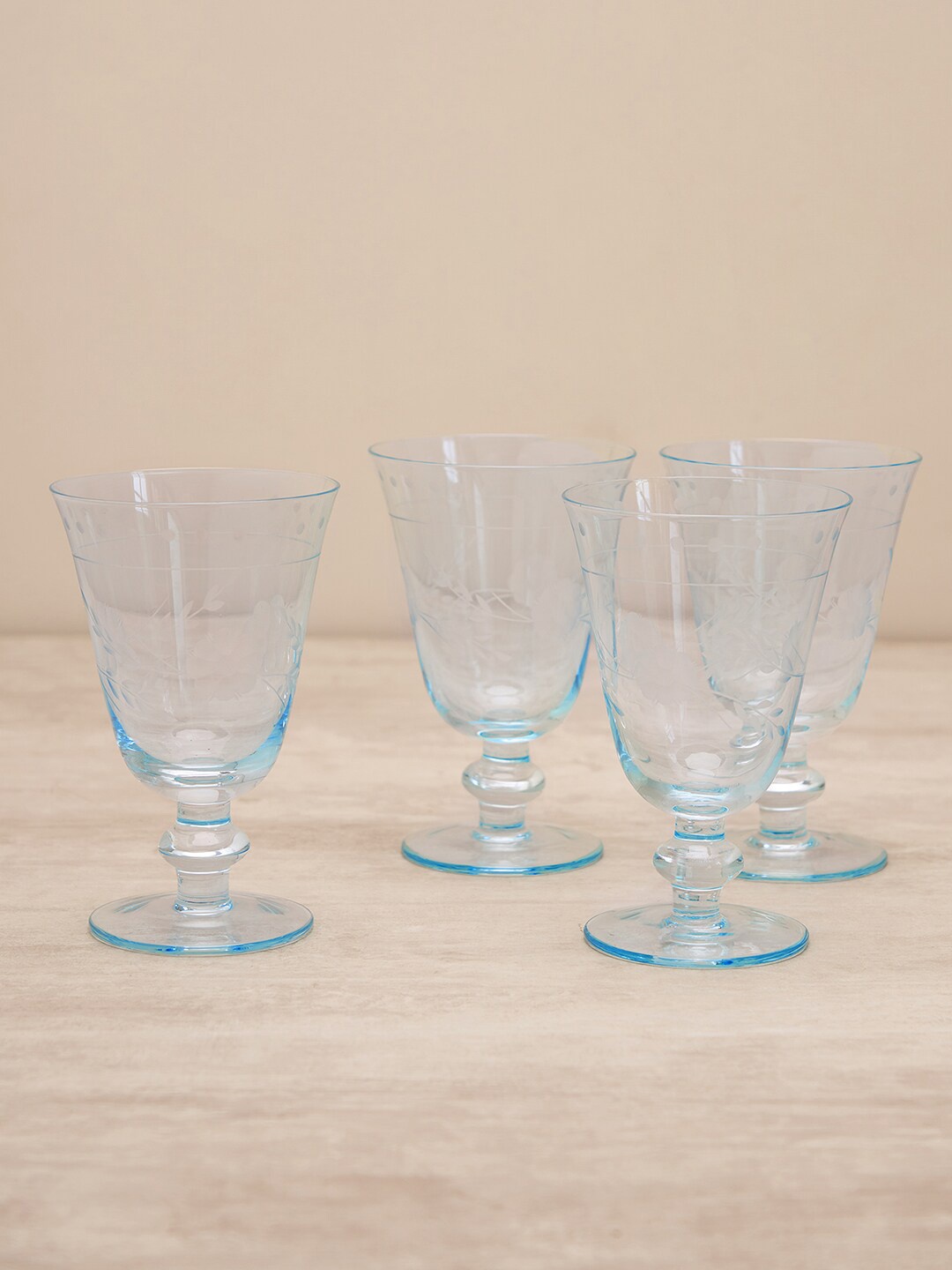 

Pure Home and Living Blue 4 Pieces Floral Textured Wine Glasses