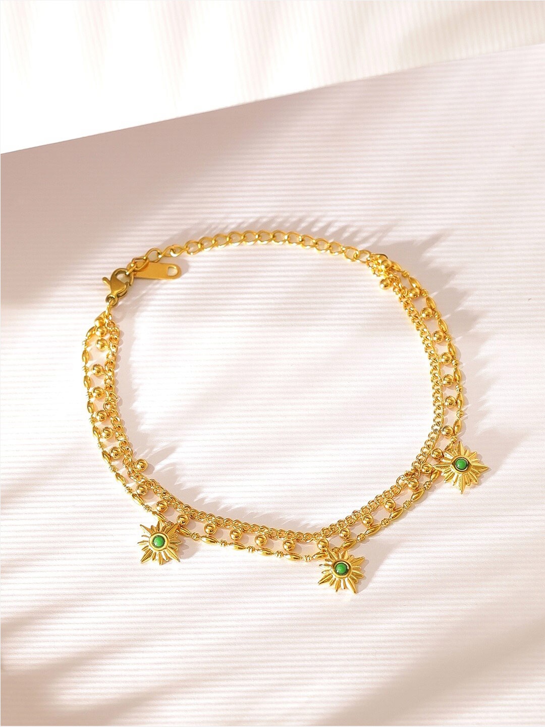 

Rubans Voguish Women Brass Cubic Zirconia Gold-Plated Multistrand Bracelet