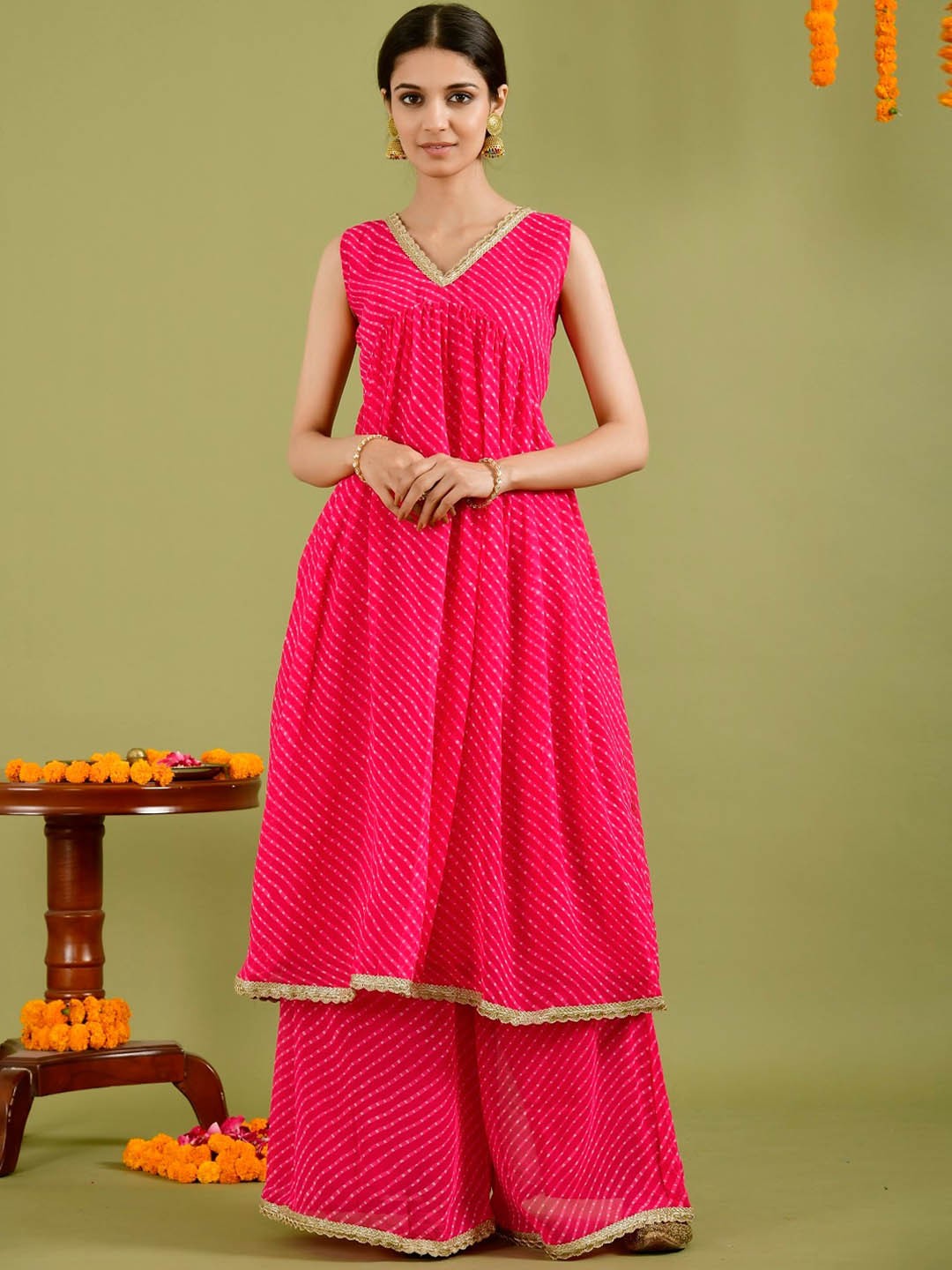 

Rangpur Leheriya Printed V Neck Gotta Patti Anarkali Kurta with Palazzos, Magenta