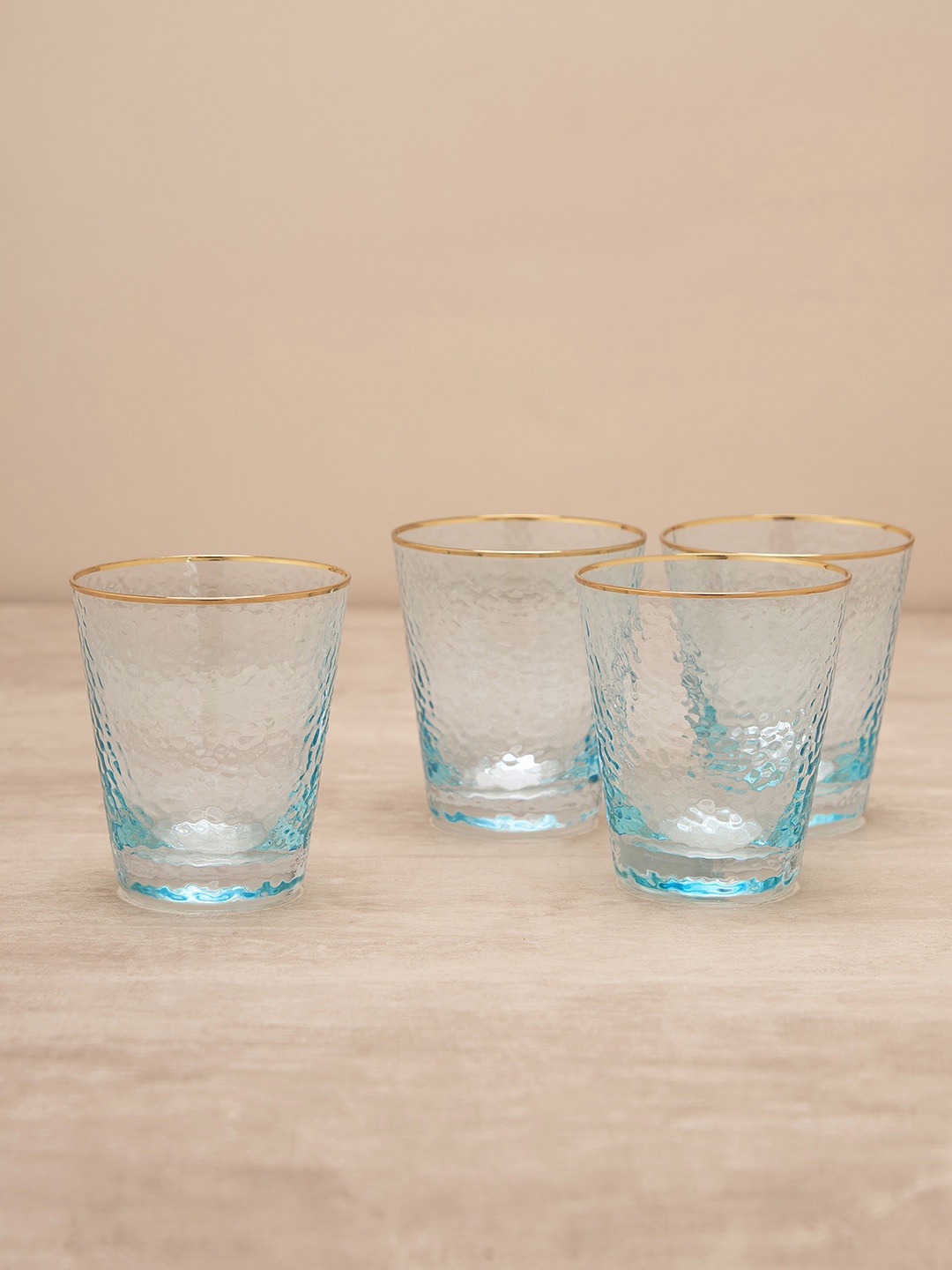 

Pure Home and Living Blue 4 Pieces Hammered Texture With Real Gold Rim Glass Tumblers